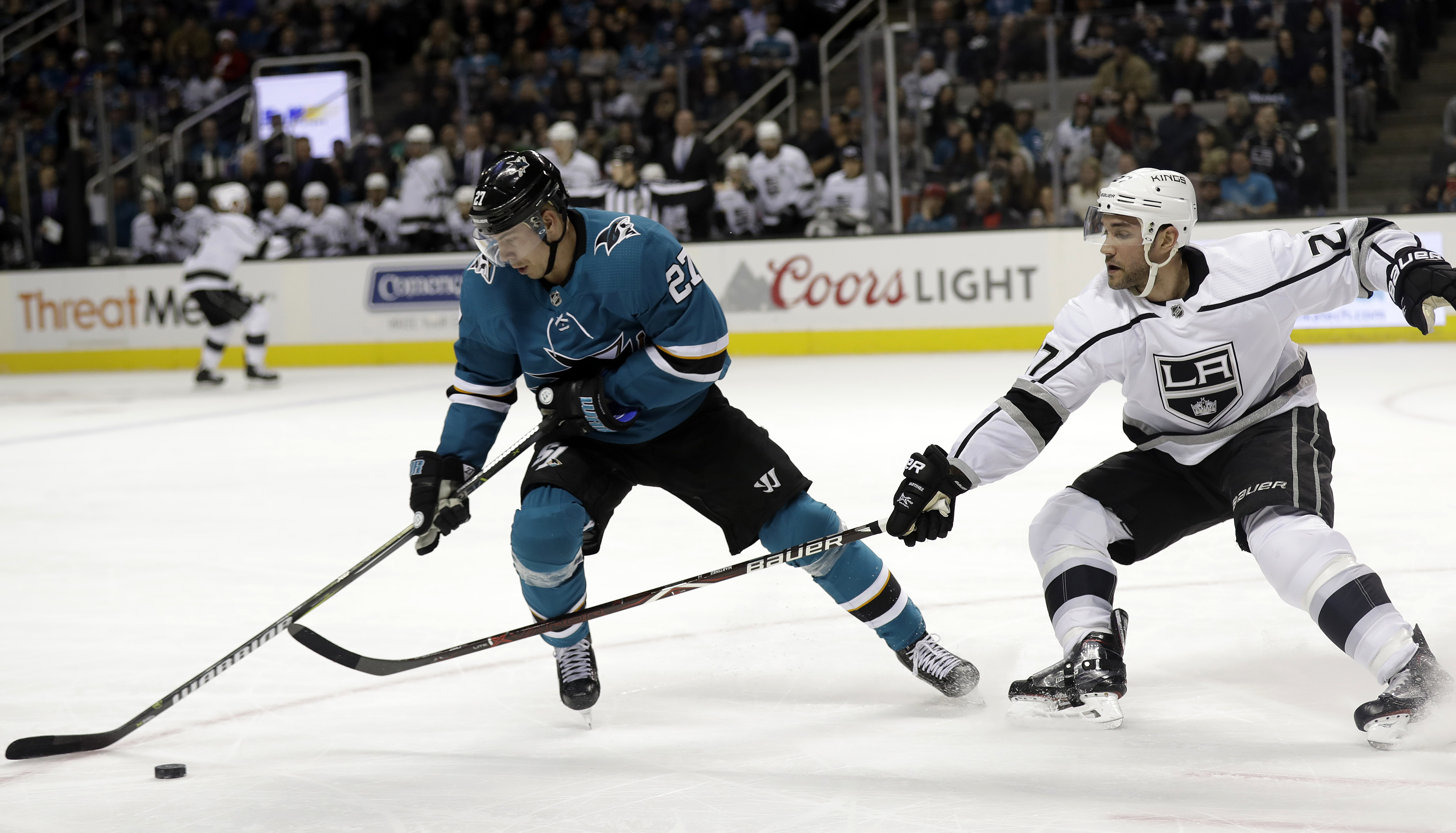 Jones makes 28 saves, Sharks beat struggling Kings 2-0