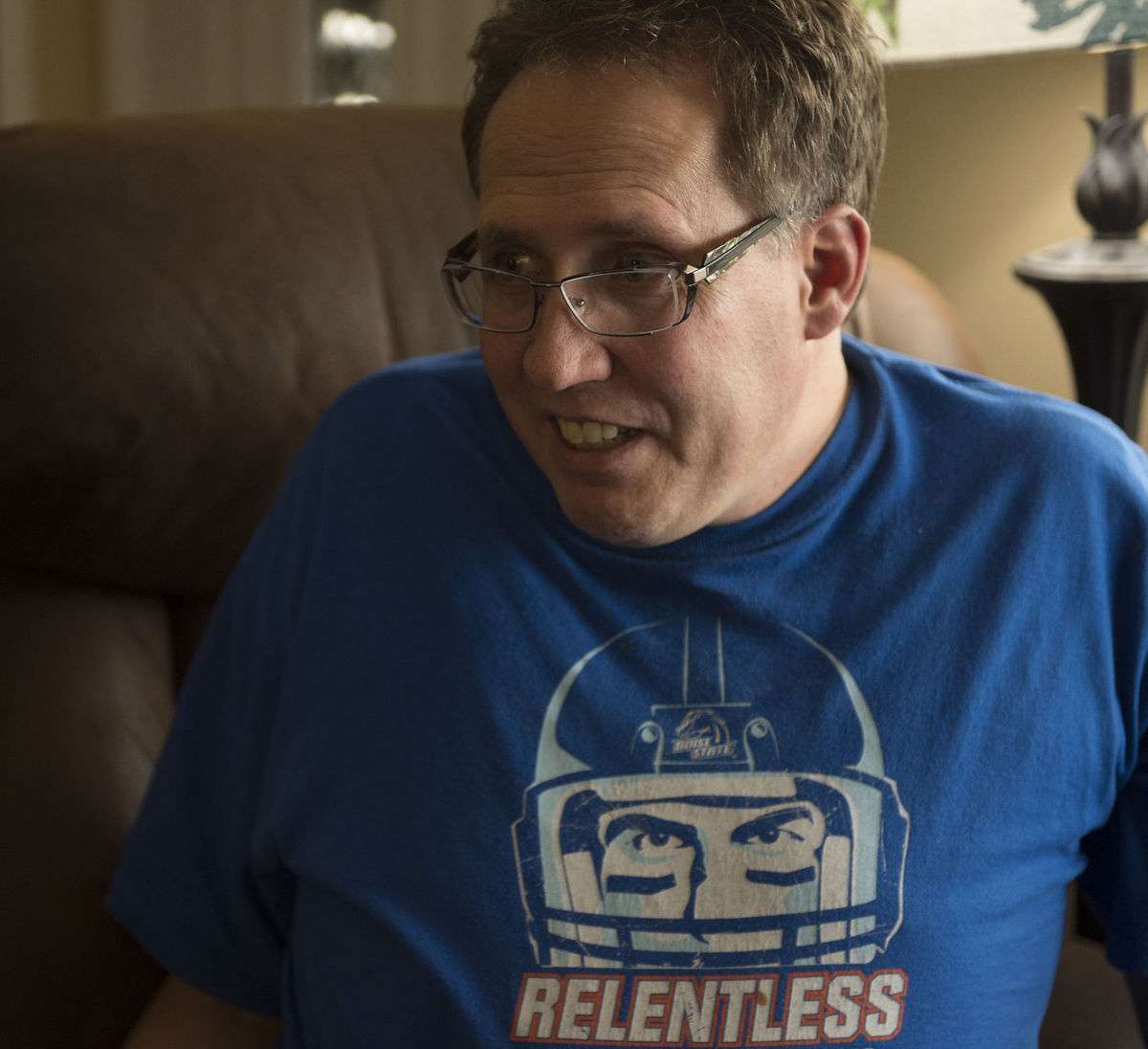 Matt Matthews talks about dealing with Parkinson's disease while volunteers build a wheelchair accessible ramp to the front door of his home in Twin Falls, Idaho, on Tuesday, Dec. 19, 2017. (Photo: Drew Nash, Twin Falls Times-News)