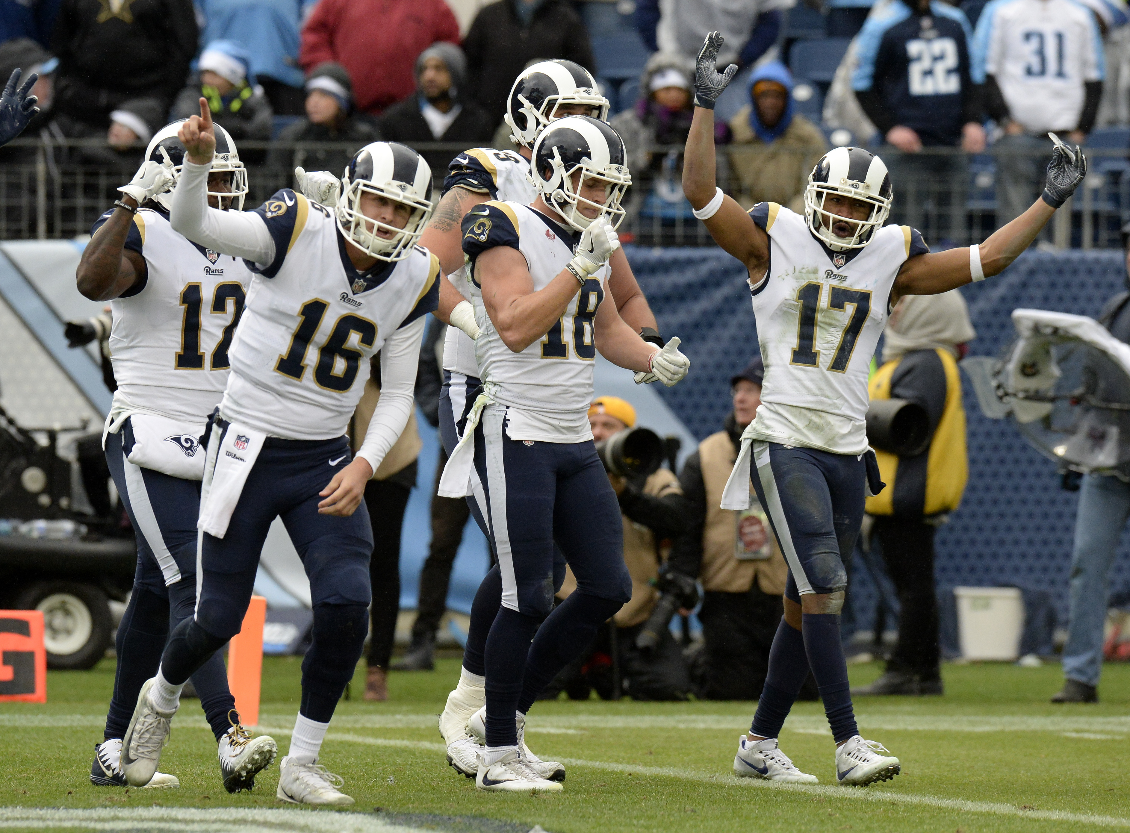 Rams clinch 1st NFC West title since '03, beat Titans 27-23