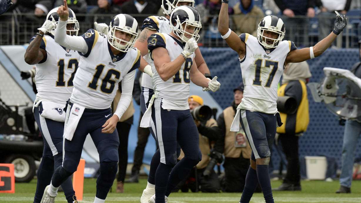 Rams clinch 1st NFC West title since '03, beat Titans 27-23