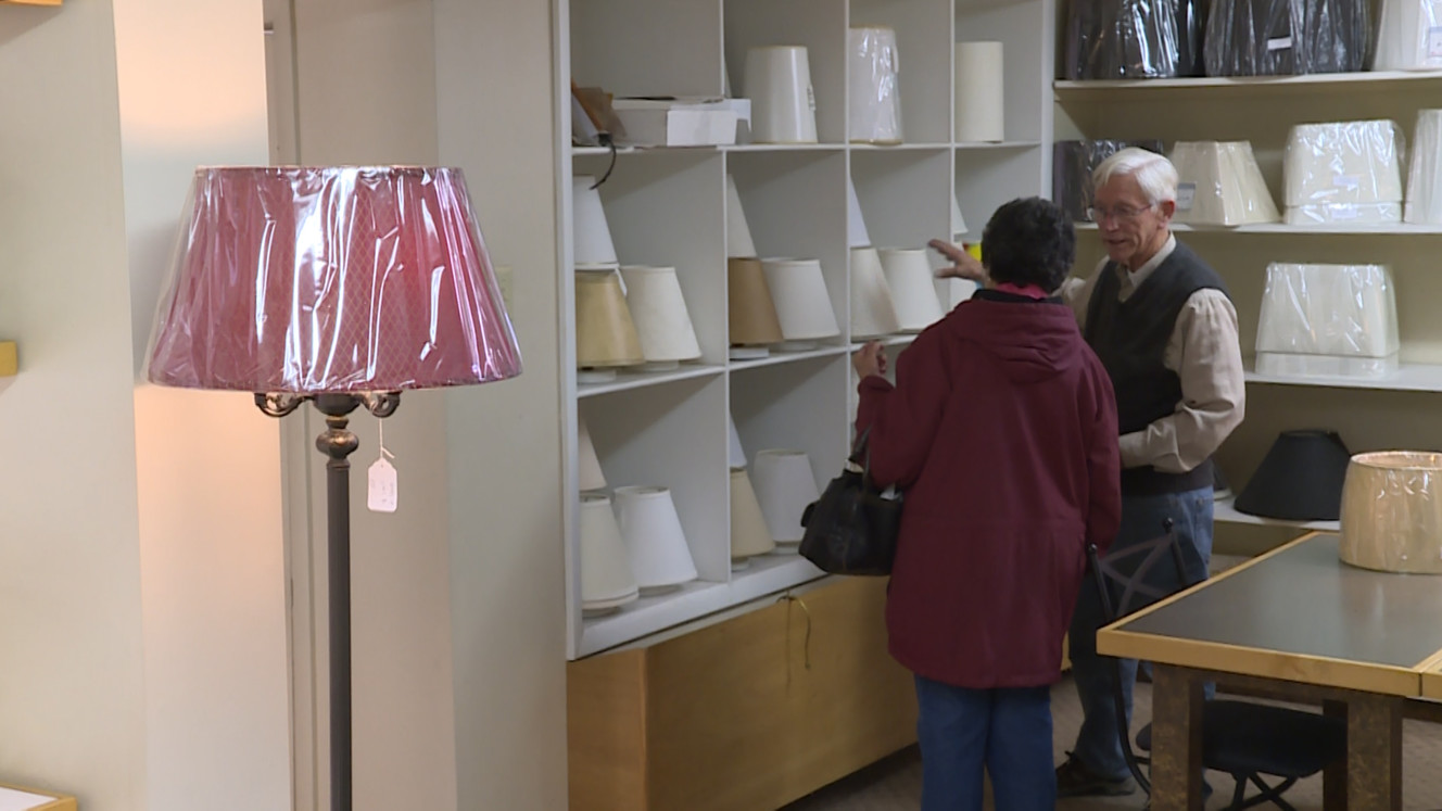 Bill Hadfield shows a customer some of the different fabrics he has available for lampshades at The Lamp Company in Salt Lake City. (December 19, 2017) (Photo: Ray Boone, KSL TV)