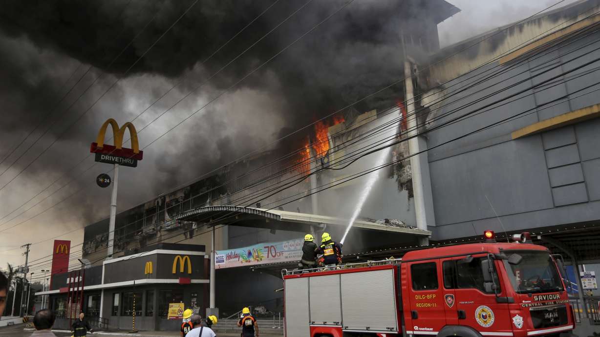 Filipino firefighters find all 37 bodies of workers in mall