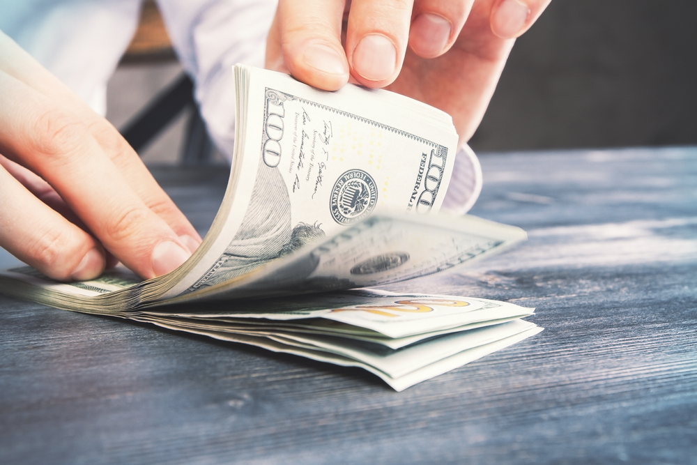 More money can mean Scrooge-like pride, study says