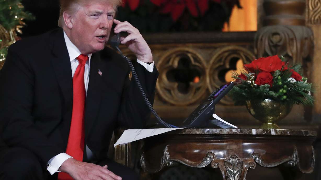 The Latest: Trump says tax cuts will make 2018 'great year'