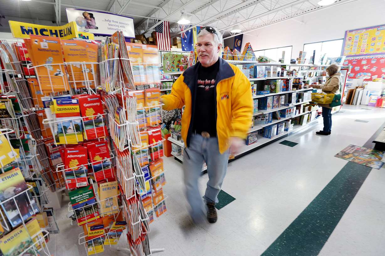 Rich Westland searches for a map at Utah-Idaho Supply/Map World in West Jordan on Wednesday, Dec. 27, 2017. The company announced it is closing after more than 120 years in business. (Photo: Scott G Winterton, KSL)