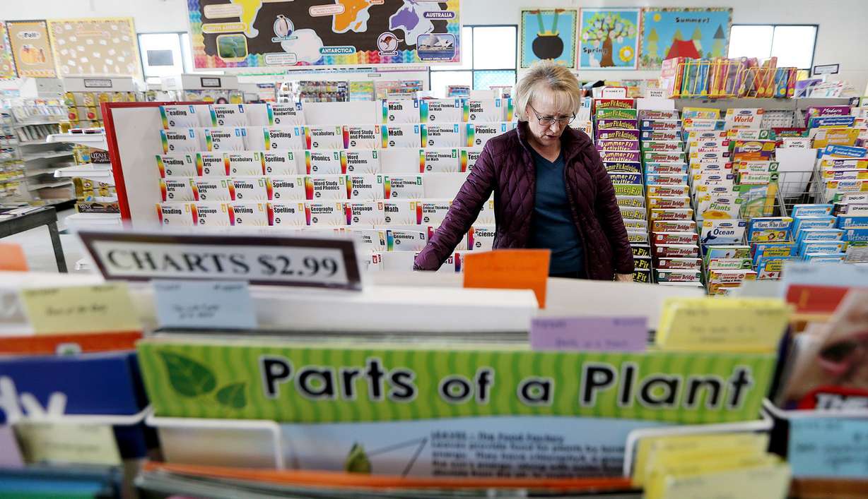 Judy Cutler, a fifth-grade teacher at Crestview Elementary School, shops at Utah-Idaho Supply/Map World in West Jordan on Wednesday, Dec. 27, 2017. The company announced it is closing after more than 120 years in business. (Photo: Scott G Winterton, KSL)