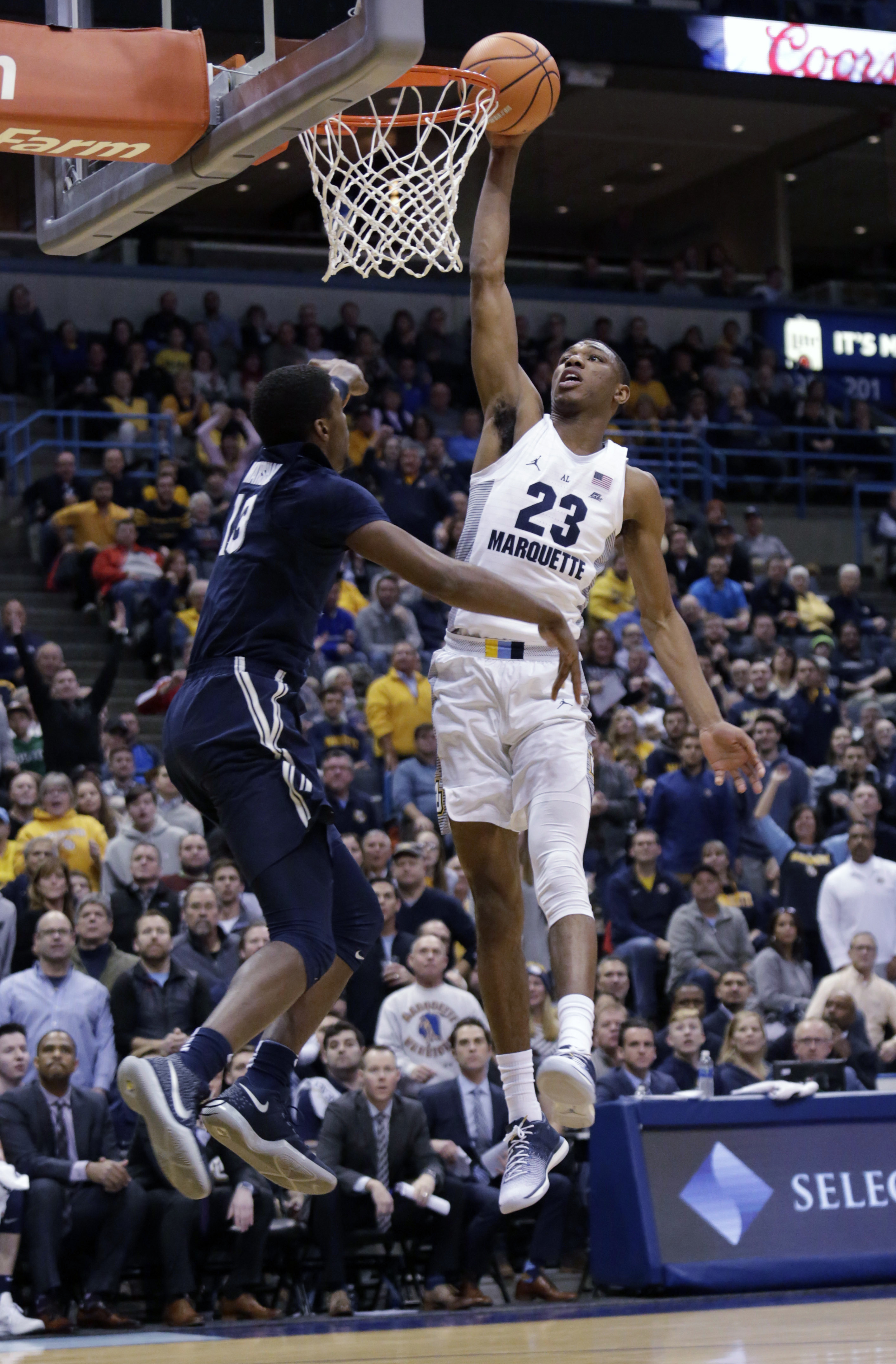 No. 6 Xavier takes league opener, holds off Marquette 91-87