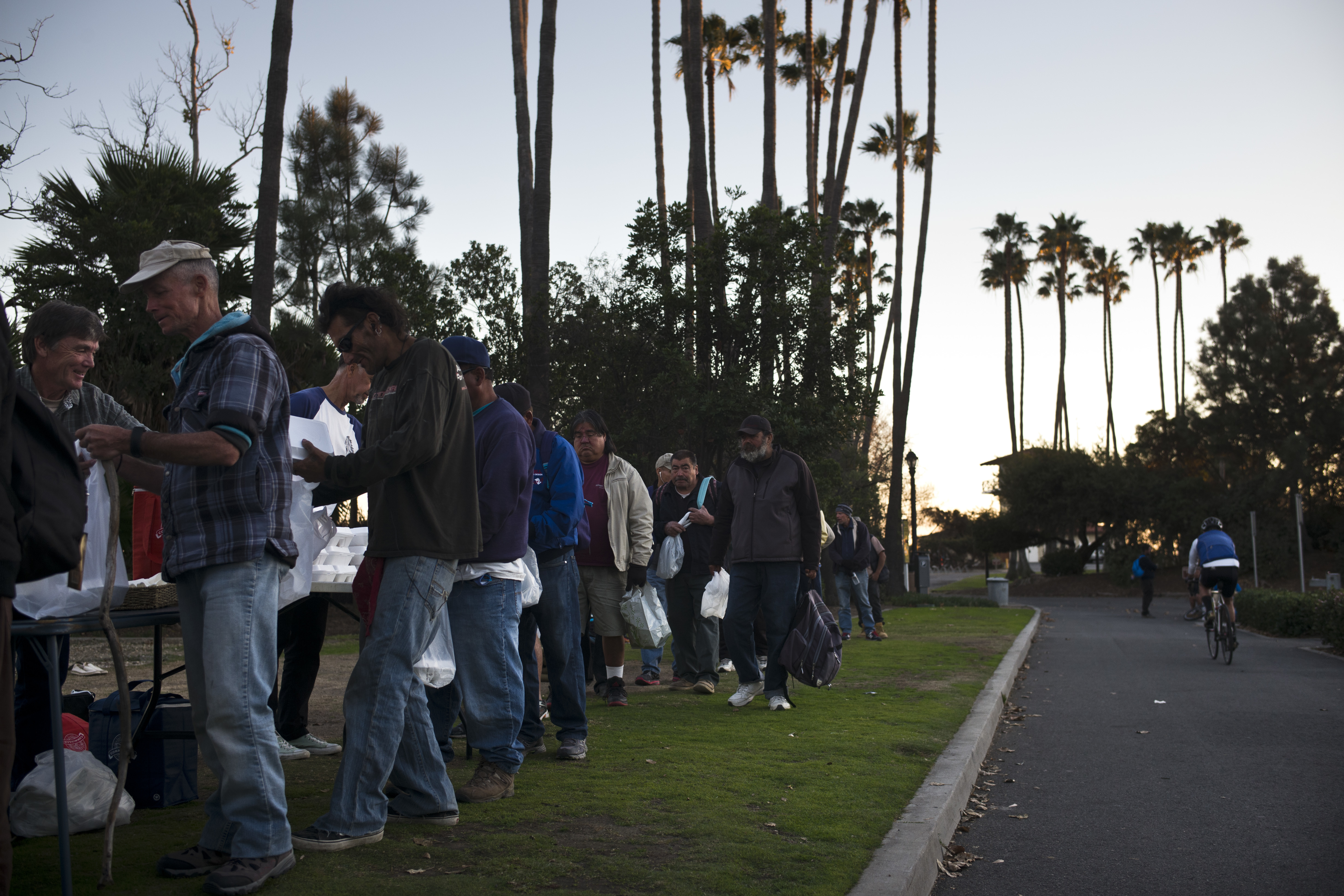 Homeless people wait in line for a free meal Thursday, Dec. 21, 2017, in Dana Point, Calif. Photo: Jae C. Hong, AP Photo