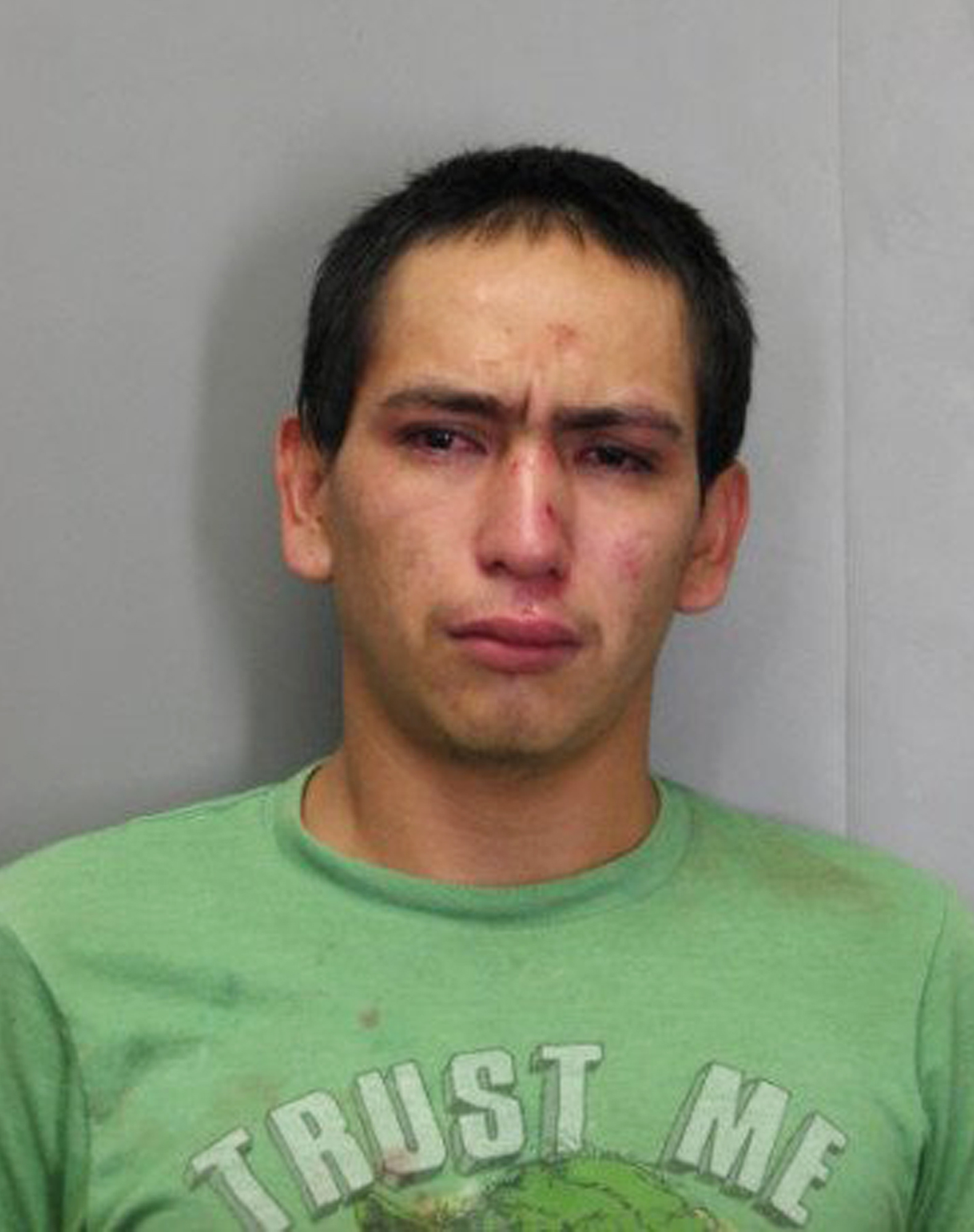 Police: Suspect wearing "Trust Me" T-shirt steals car