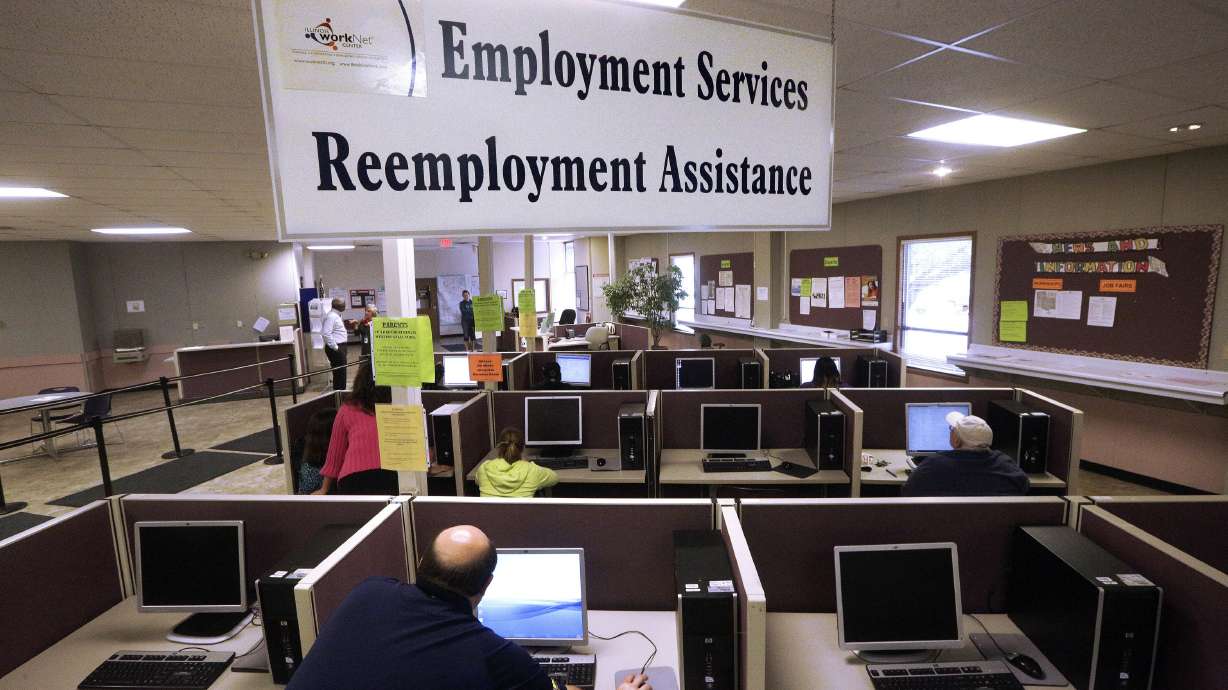 Applications for US jobless aid hold at 245,000
