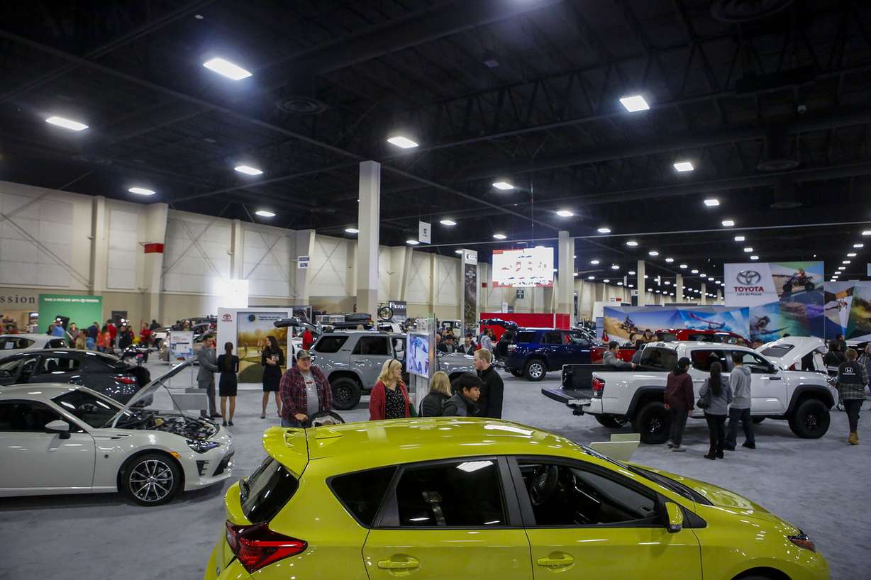 Patrons walk around the Utah International Auto Expo at the South Towne Exposition Center in Sandy on Sunday, Jan. 15, 2017. Photo: Nicole Boliaux, KSL