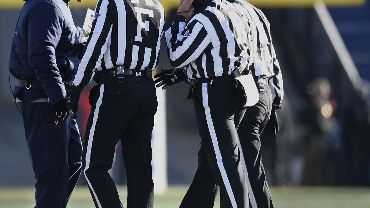 Abey's 5 TDs help Navy beat Virginia 49-7 in Military Bowl