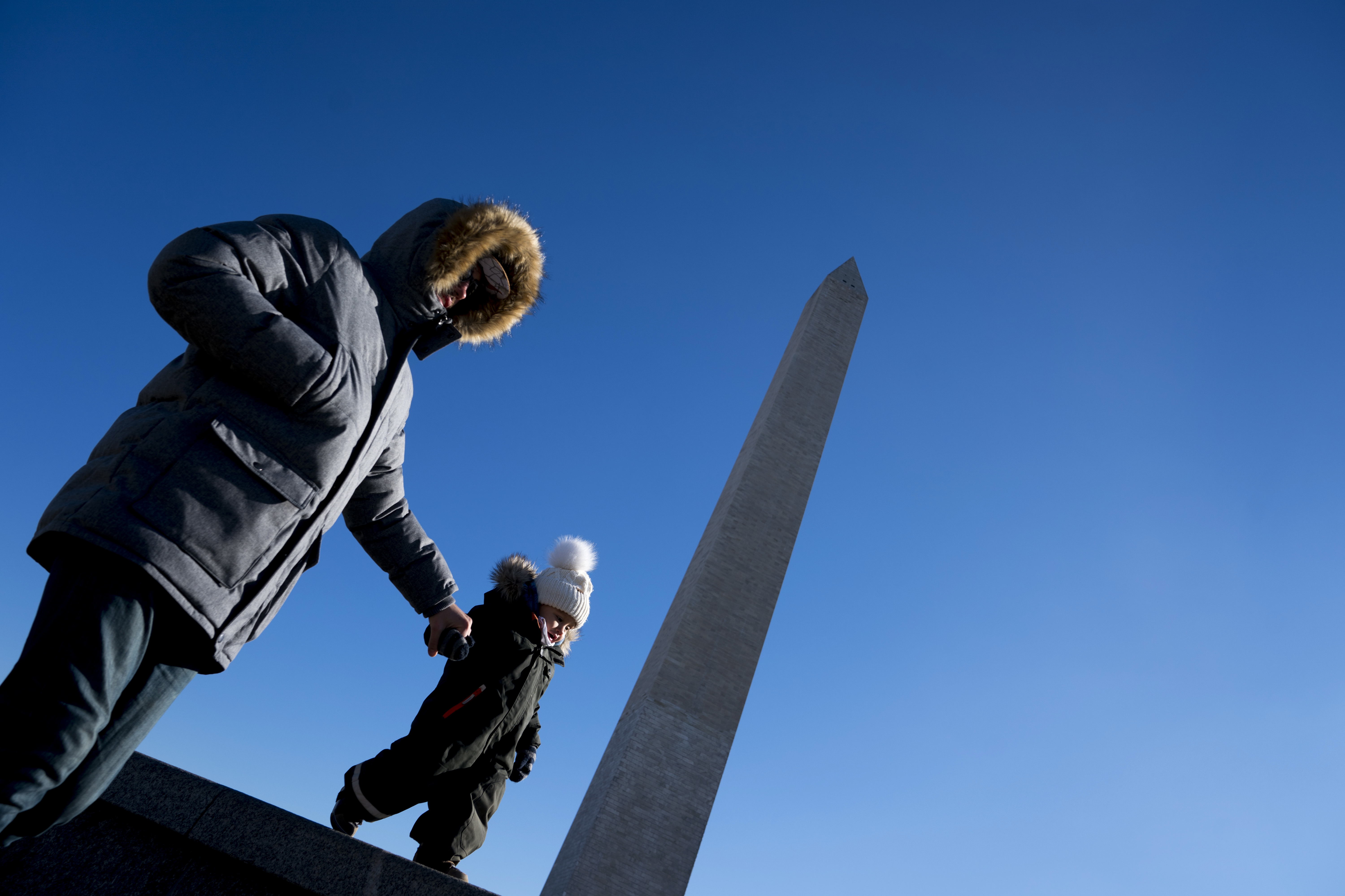 The Latest: Big Apple ball drop is on; Boston transit woes