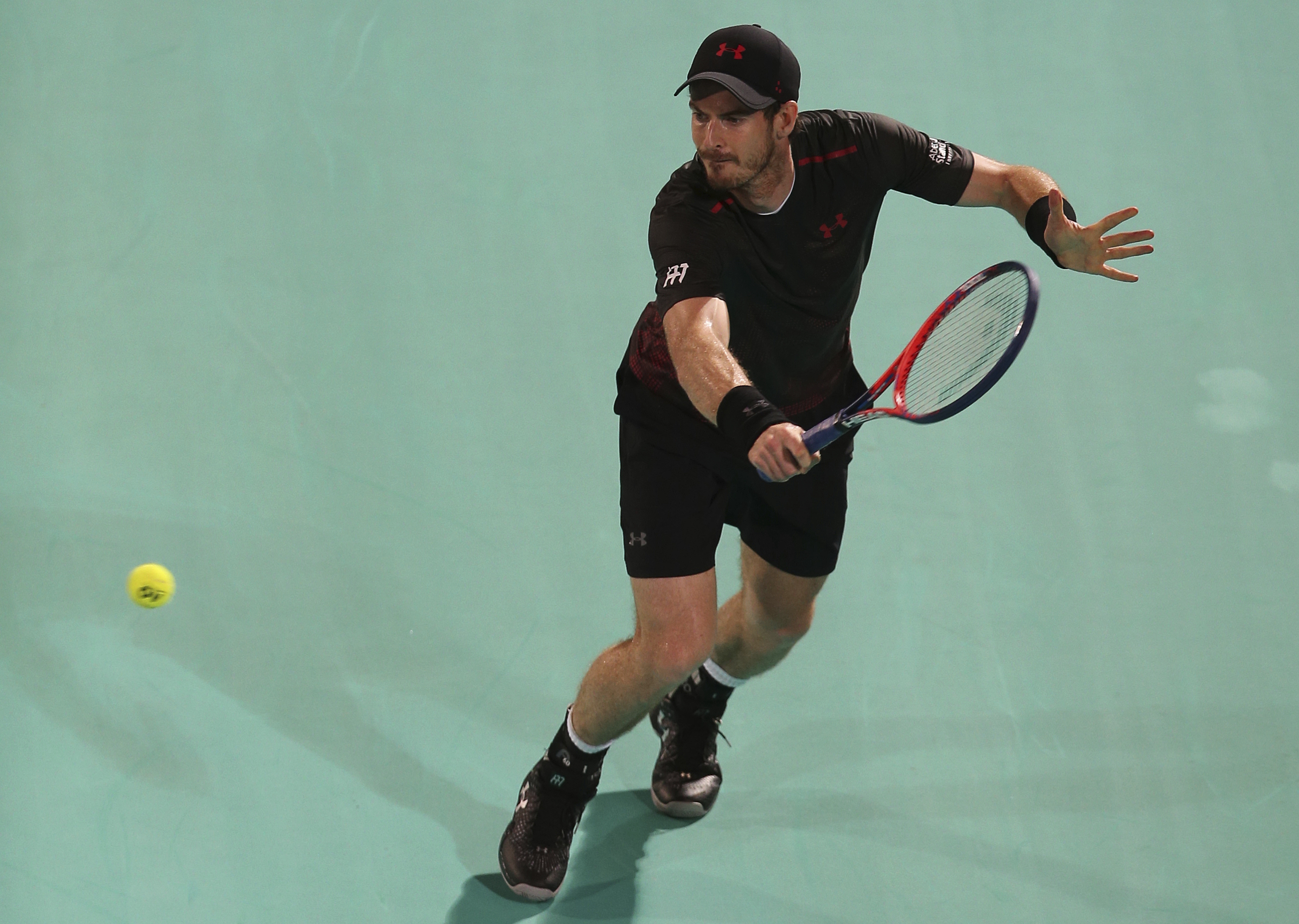 Andy Murray makes tepid return as he loses exhibition match