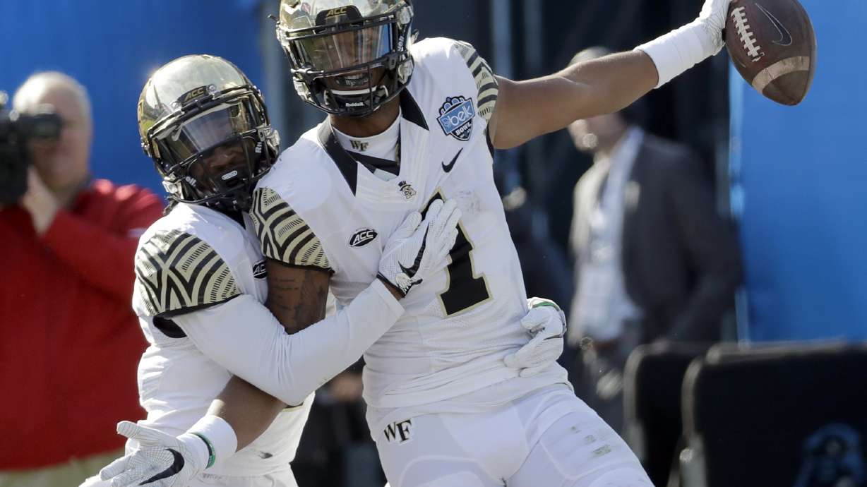 Wolford throws 4 TD passes, Wake Forest tops Texas A&M 55-52
