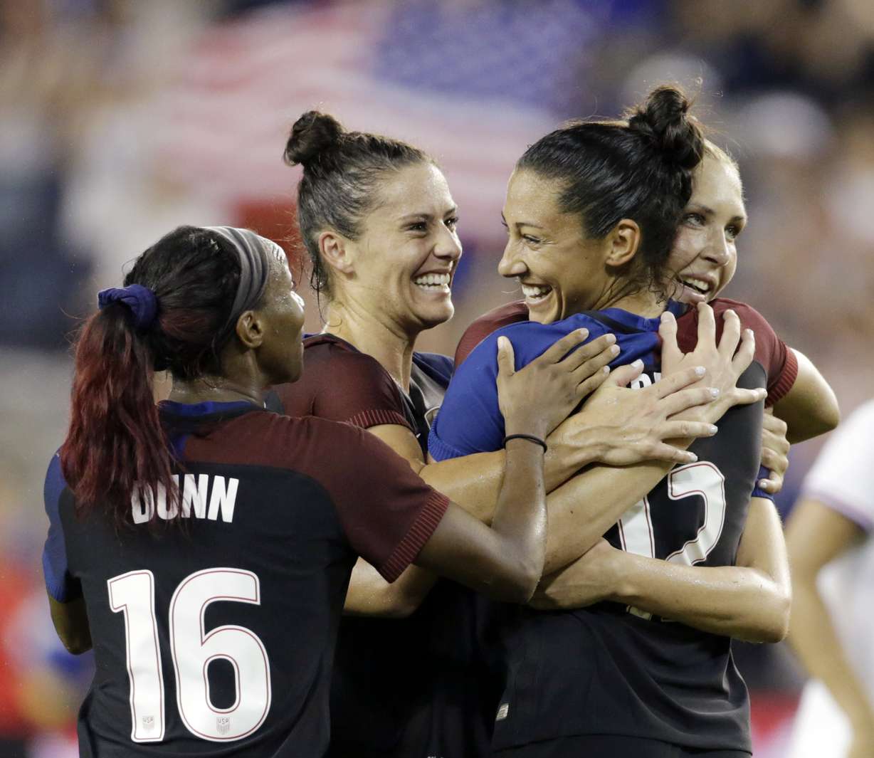 United States forward Christen Press, second from right, is congratulated by Crystal Dunn (16, Ali Krieger, second from left, and Allie Long, right, after scoring against Costa Rica in the second half of women's international friendly soccer match, Friday, July. 22, 2016, in Kansas City, Kan. (Photo: Colin E. Braley, AP)