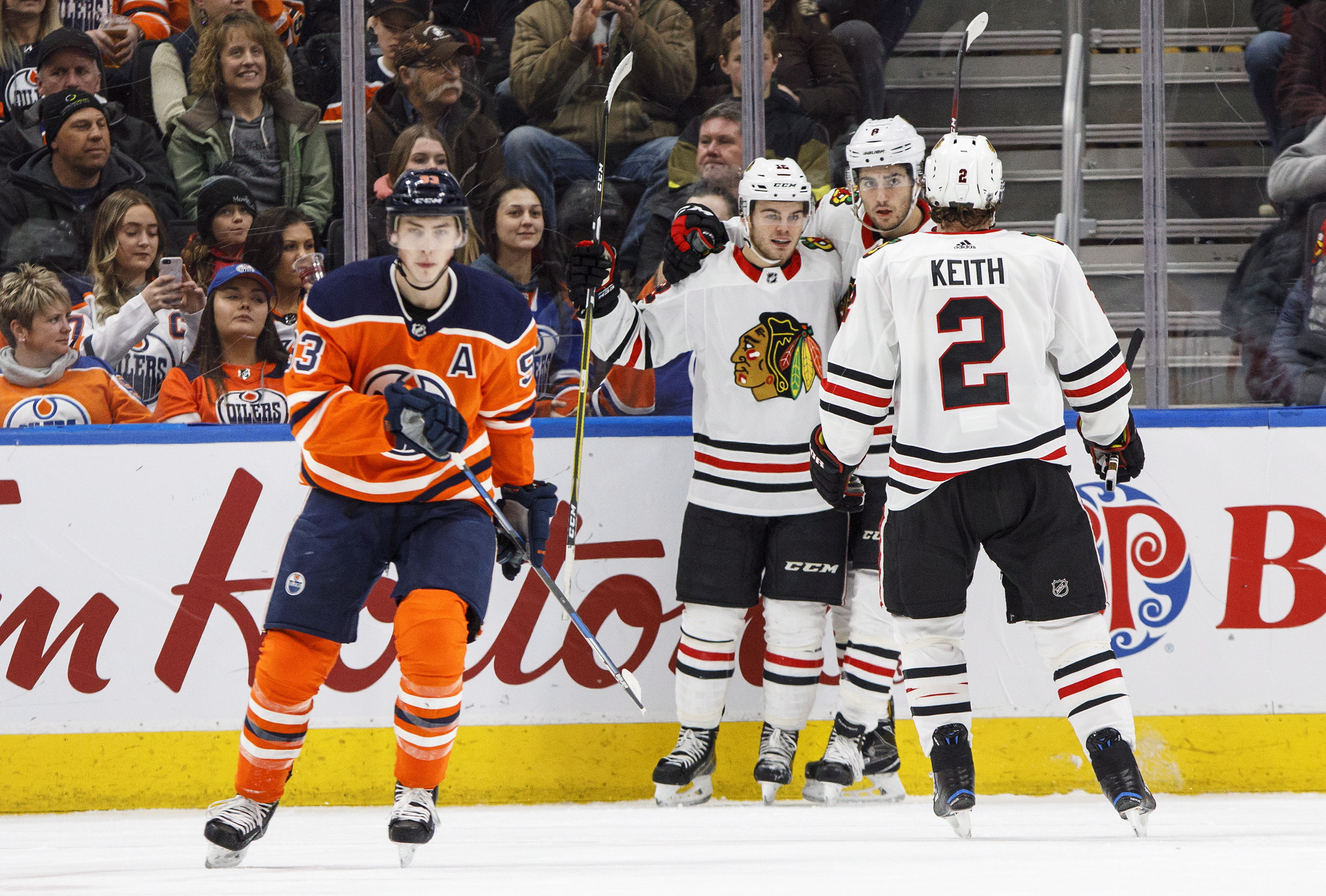 Kane's OT goal gives 32-year-old Chicago goalie win in debut