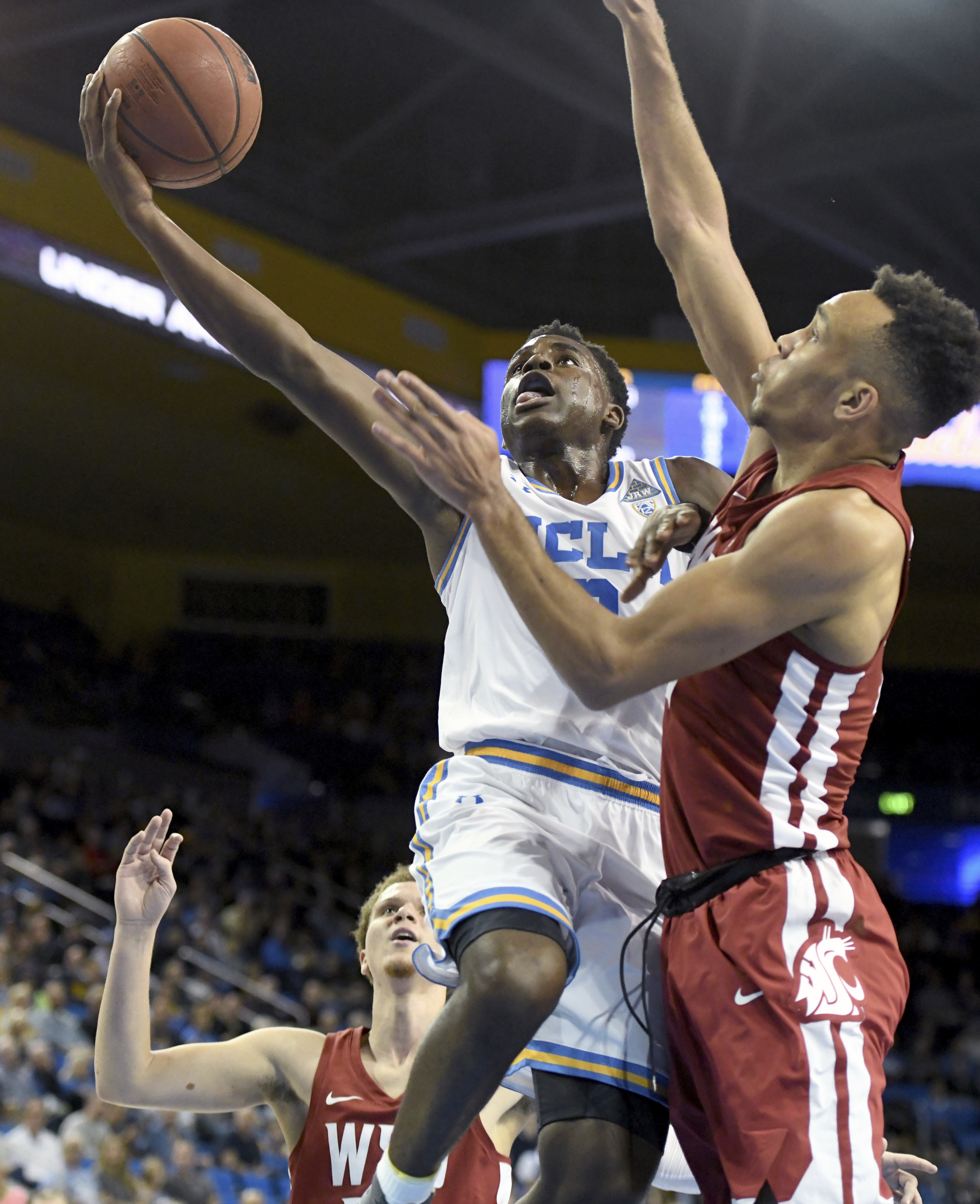 Holiday with 33, UCLA opens Pac-12 96-82 over Washington St
