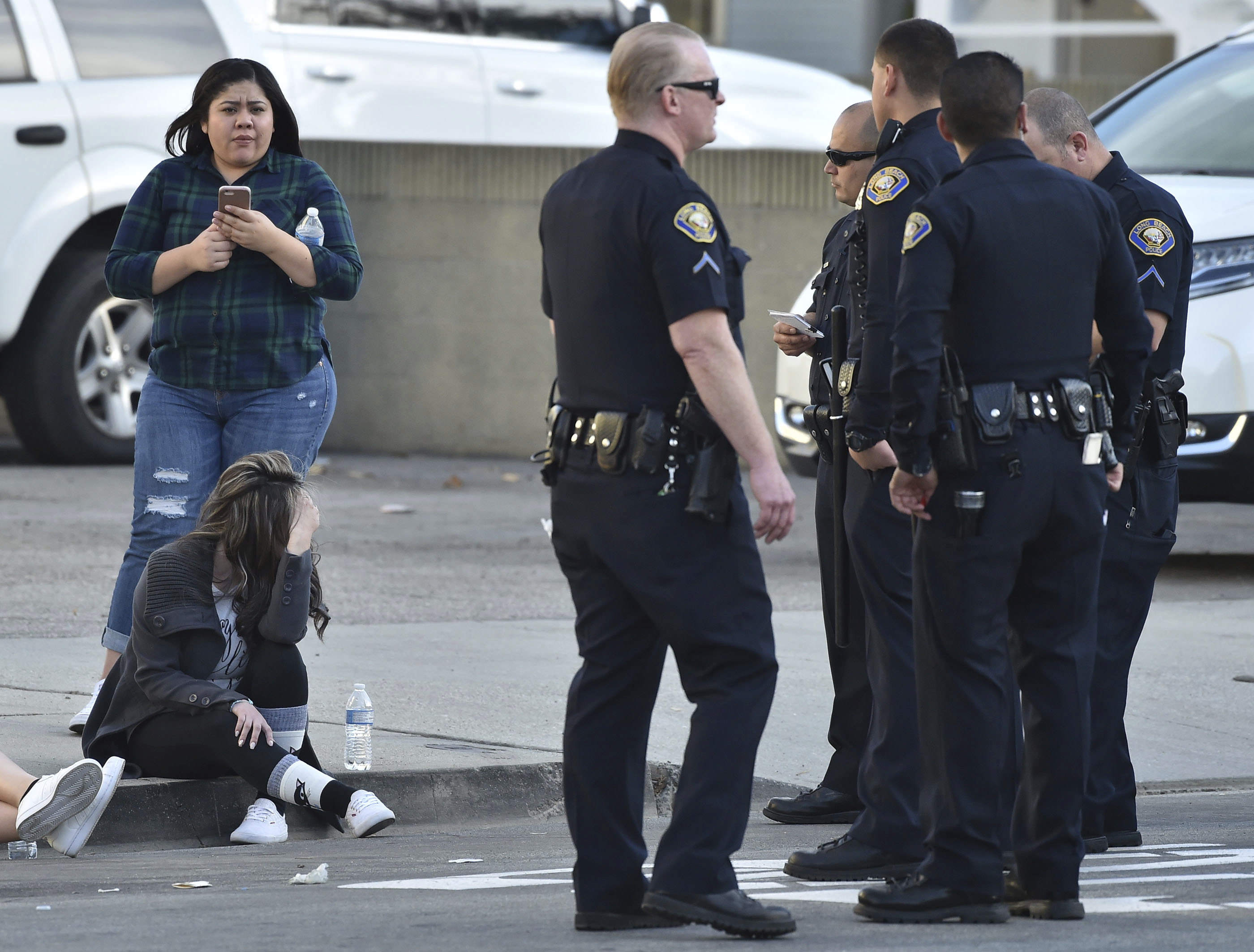 The Latest: Victim, gunman partners at California law firm