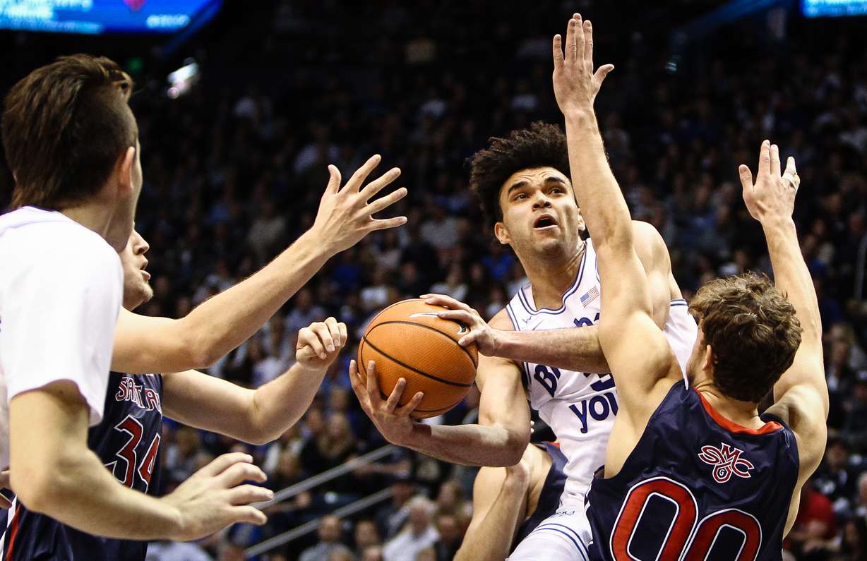 Brigham Young Cougars guard Elijah Bryant (3) drives and shoots around St. Mary's Gaels guard Tanner Krebs (00) in the first half as the BYU Cougars take on the Saint Mary's Gaels in the Marriott Center in Provo on Saturday, Dec. 30, 2017. (Photo: Adam Fondren, Deseret News)