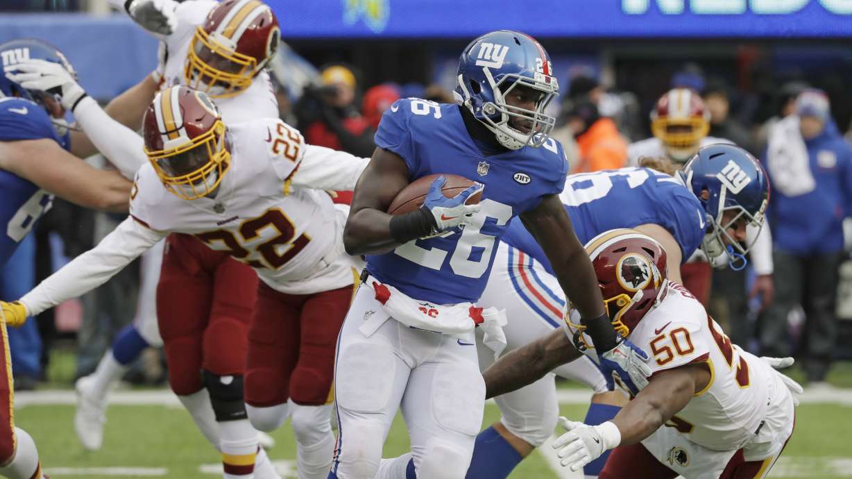 Giants close dismal season with 18-10 win over Washington