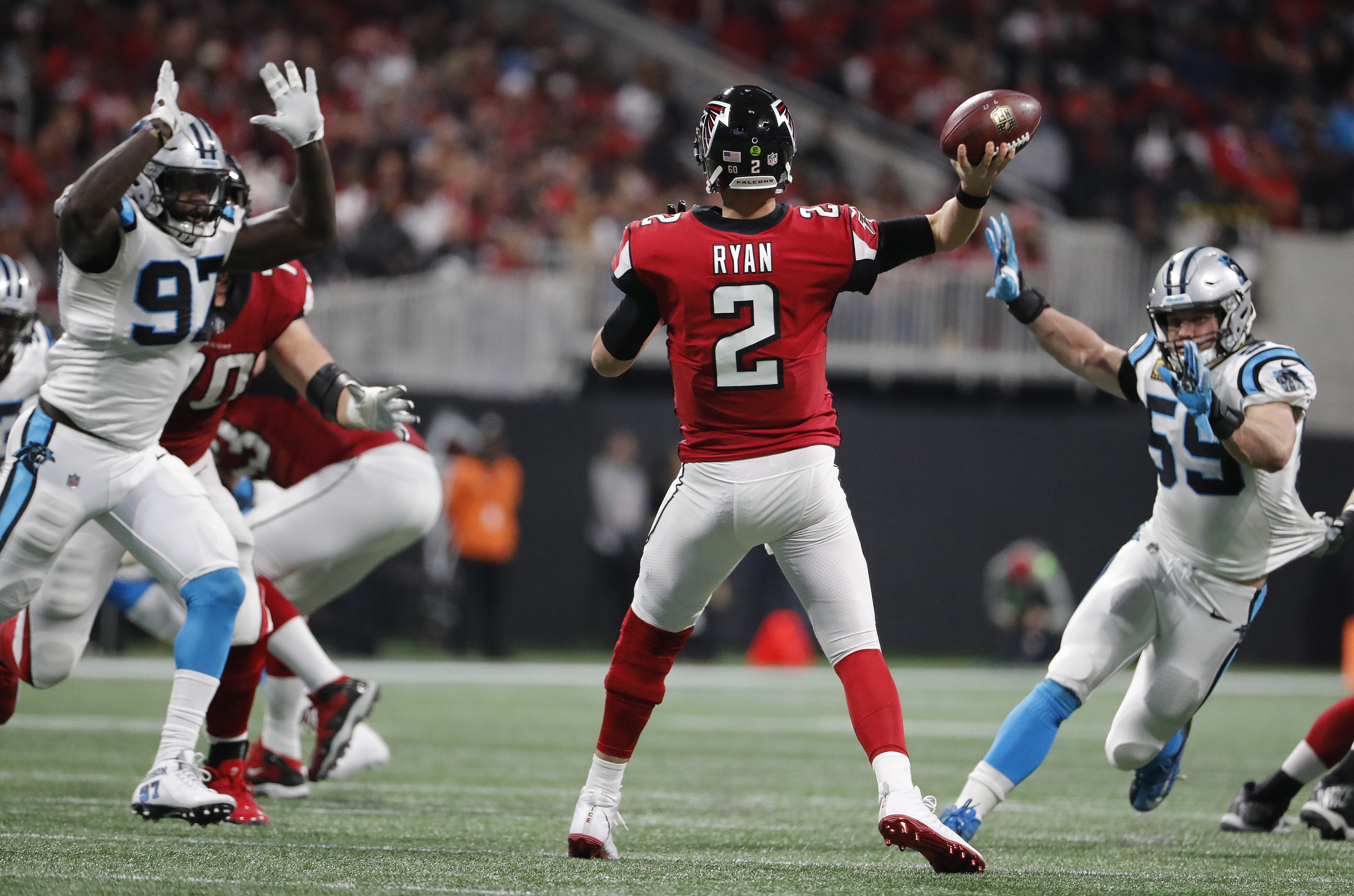Atlanta Falcons quarterback Matt Ryan (2) works in the pocket against Carolina Panthers' Luke Kuechly (59) and Mario Addison (97) during the first half of an NFL football game, Sunday, Dec. 31, 2017, in Atlanta. (Photo: David Goldman, AP Photo)