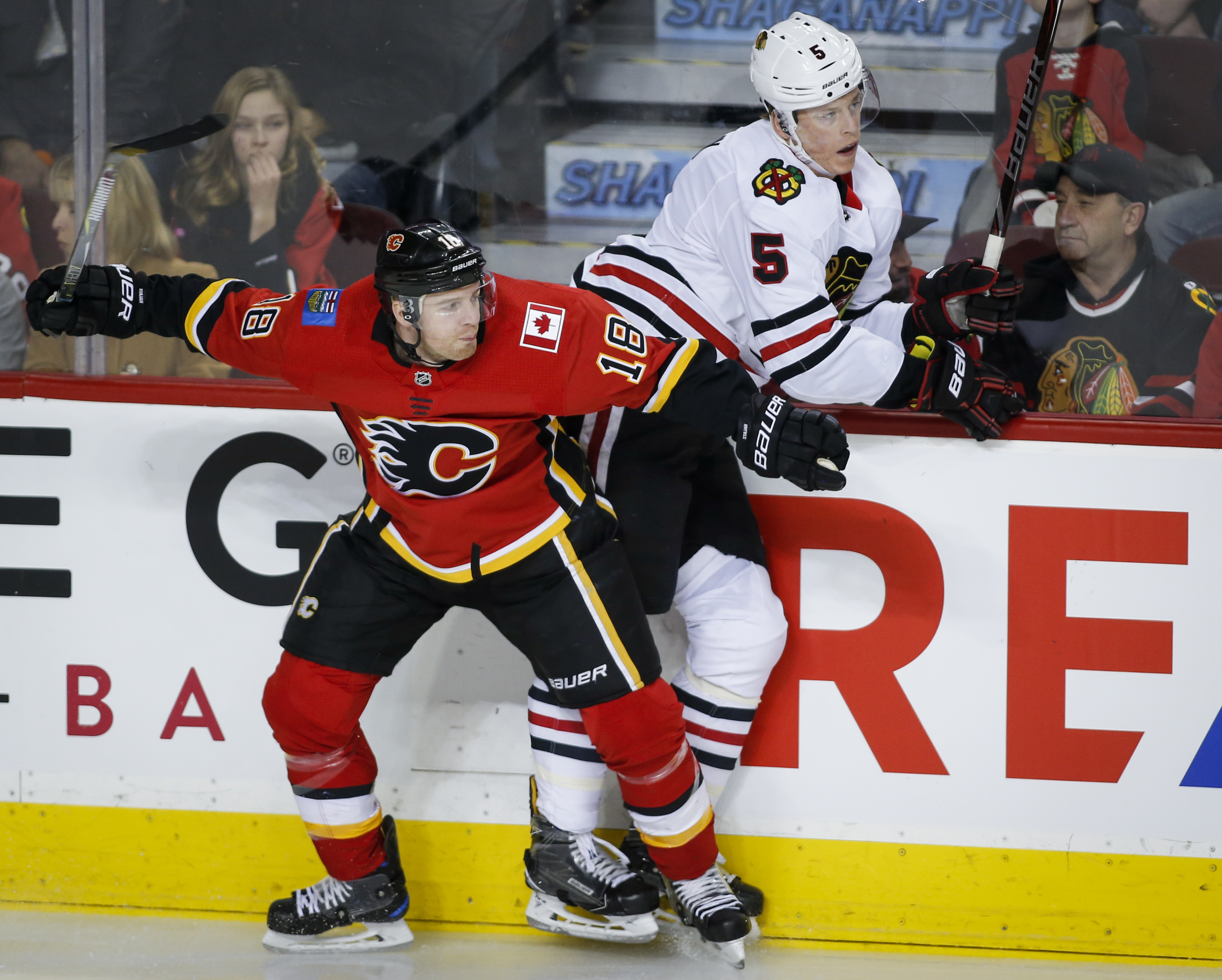 Giordano scores in OT to lift Flames over Blackhawks