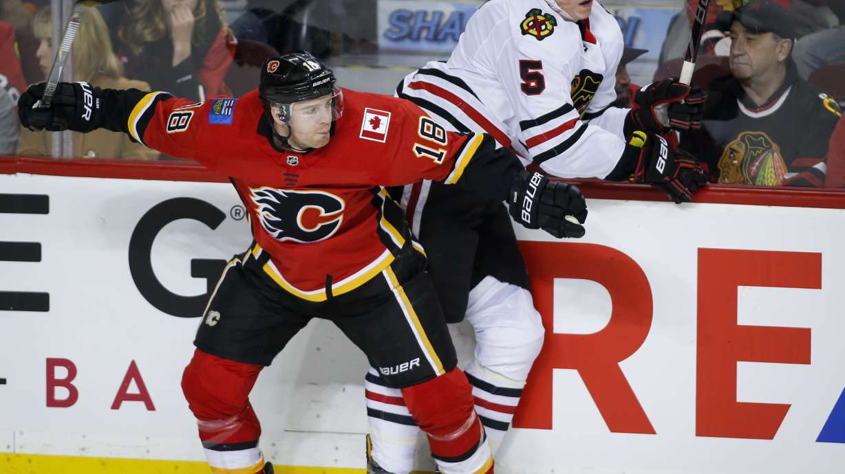 Giordano scores in OT to lift Flames over Blackhawks