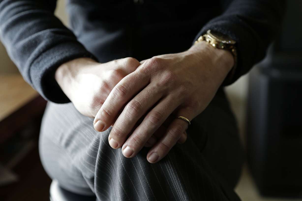 Veronica, a victim of sexual assault 13 years ago sits in the living room at her home in Fayetteville, N.C. on Dec. 15, 2017. Veronica's rape kit from the incident was among 333 kits that Fayetteville police had thrown away. Years after the kits were discarded, Fayetteville police have been working with a crisis group to call the victims and tell them what happened.