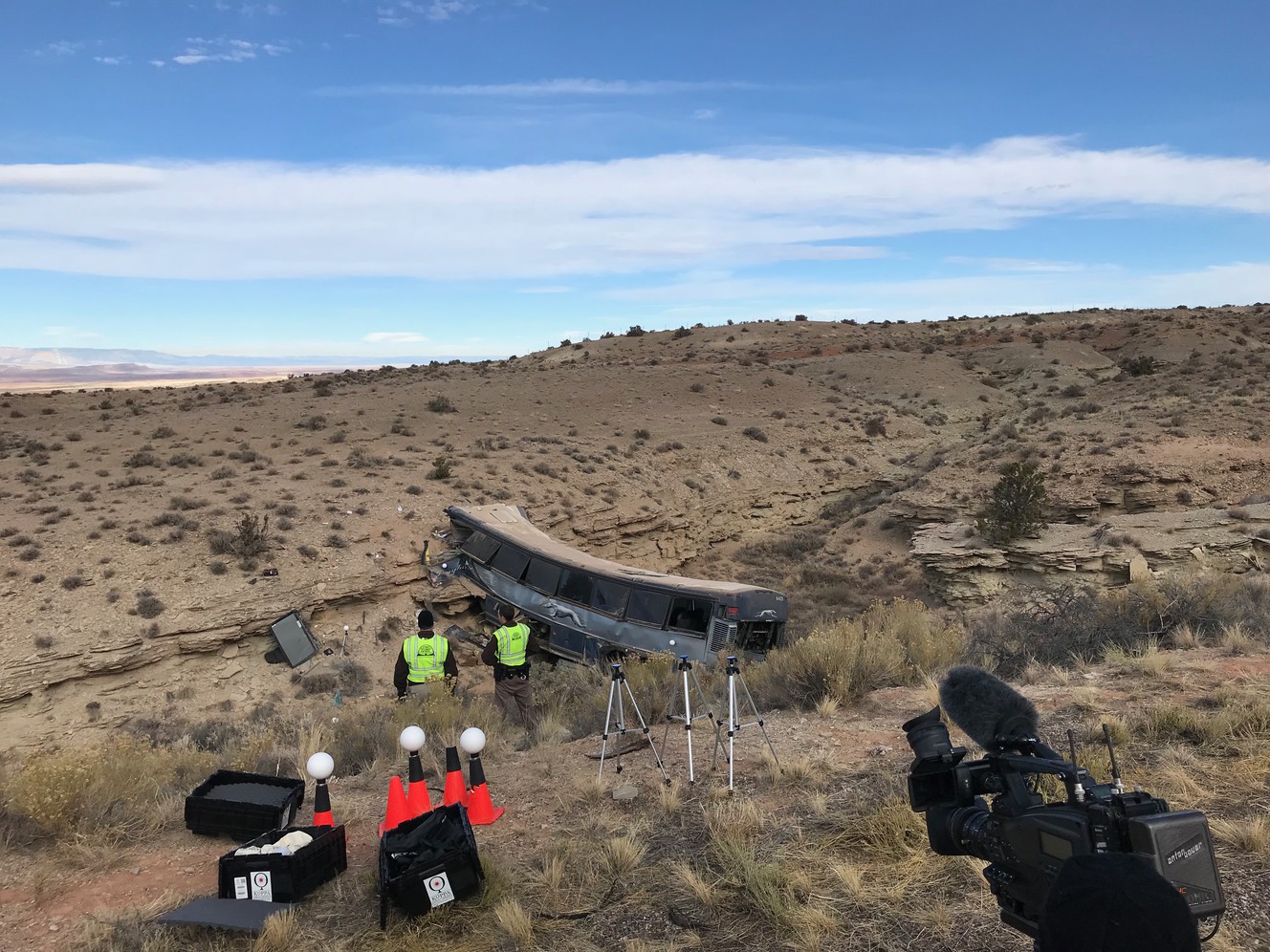 Passenger saw driver slumped over wheel before bus crash, warrant says