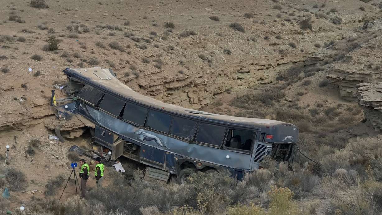 Investigators probing cause of deadly bus crash on I-70