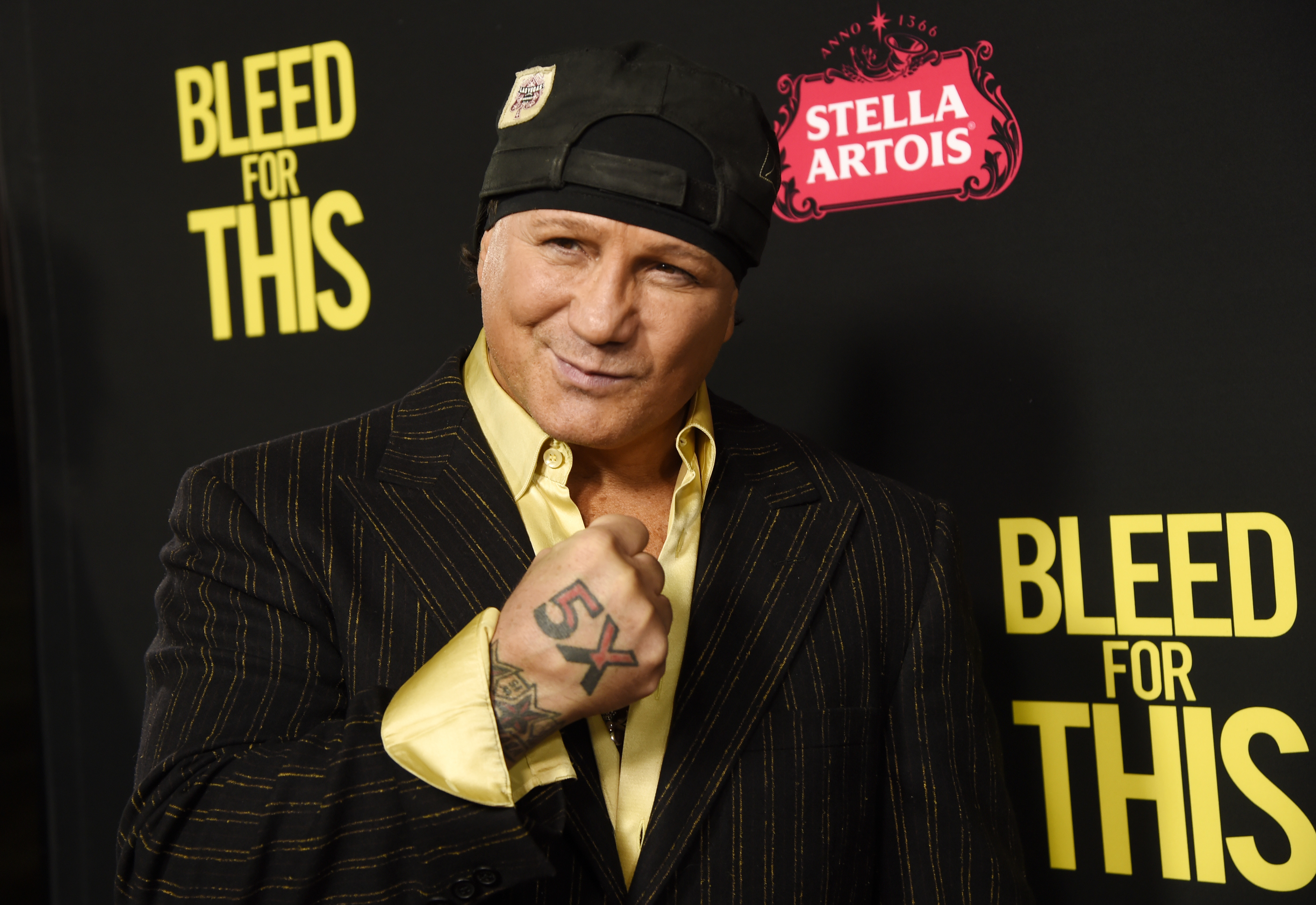 The Latest: Arrest warrant issued for ex-boxer Vinny Paz