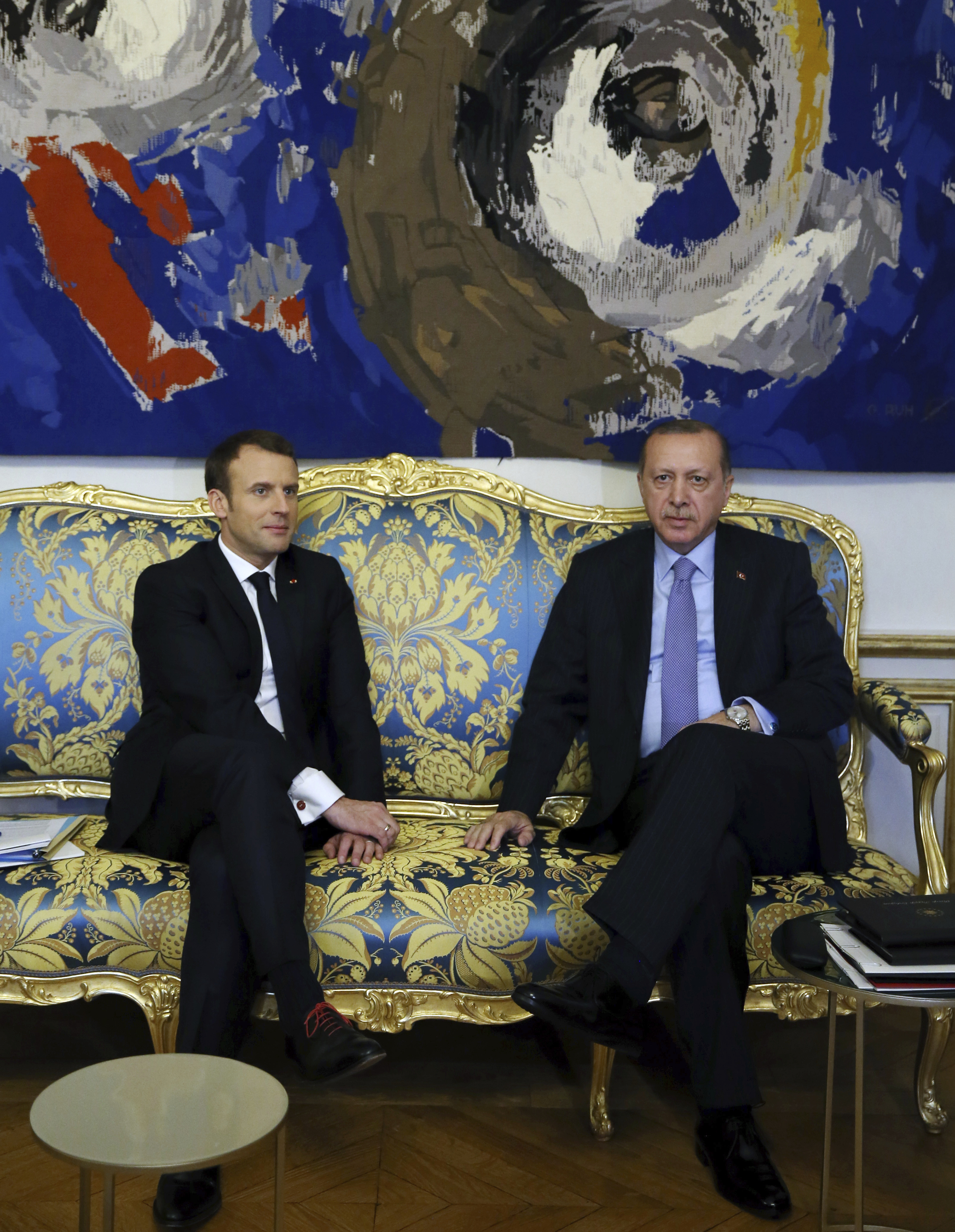 The Latest: In Paris, Erdogan calls Turkey a 'state of law'