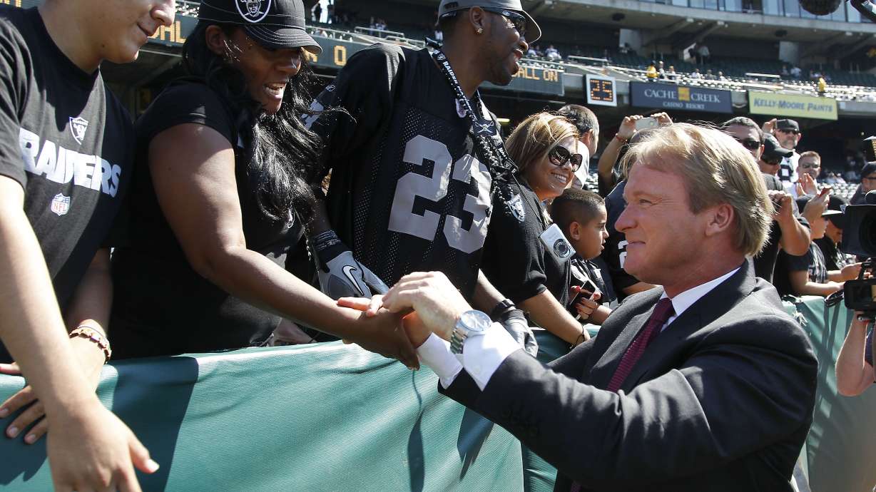 Raiders officially announce hiring of Gruden as coach