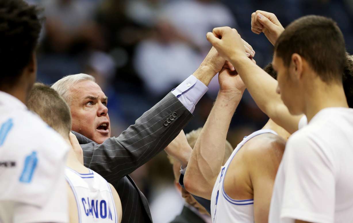Brigham Young Cougars head coach Dave Rose in the huddle during a timeout as BYU and Illinois State play in an NCAA men's basketball game in Provo on Wednesday, Dec. 6, 2017. BYU won 80-68. (Photo: Scott G Winterton, KSL)