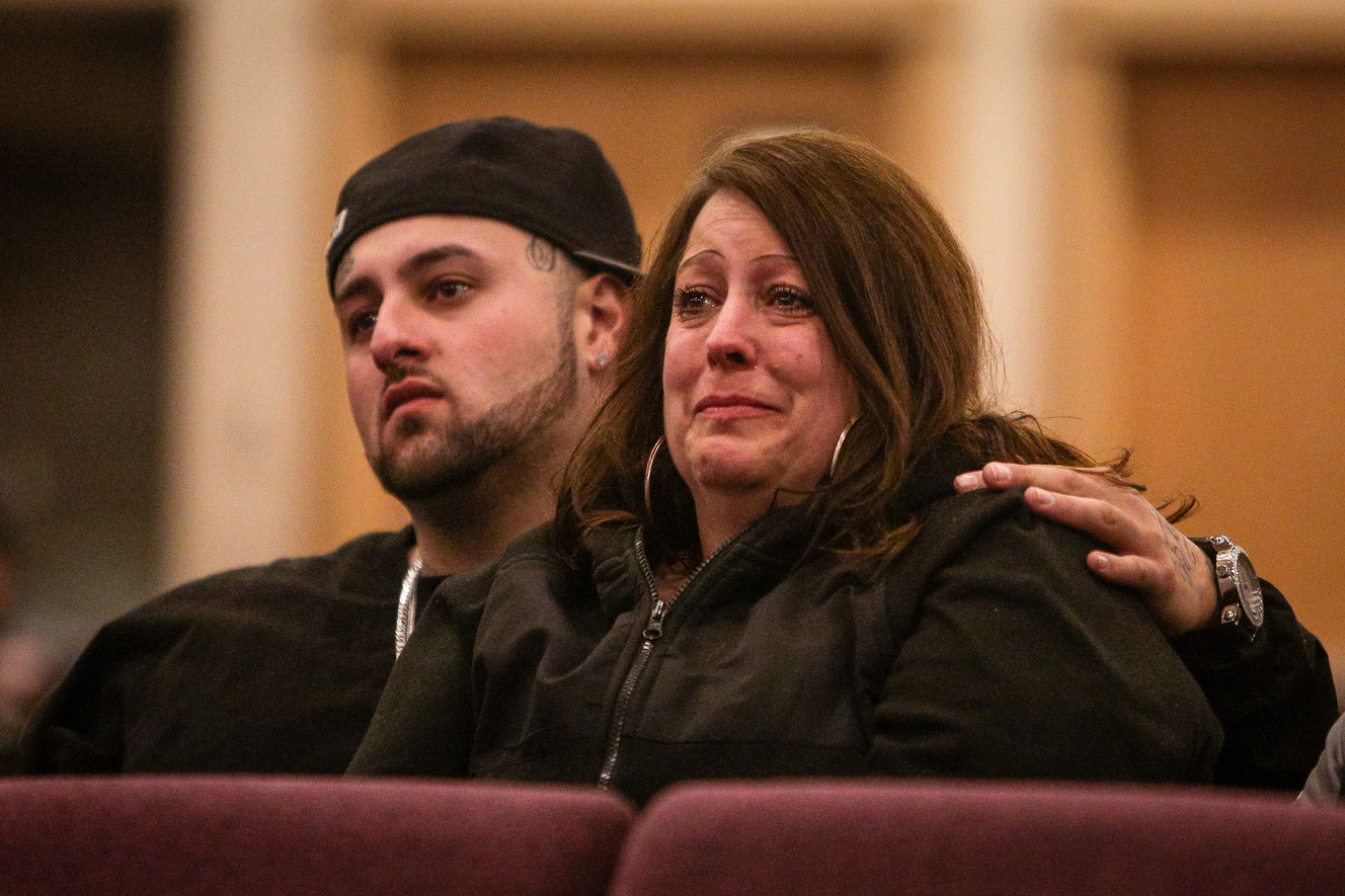 AJ Vizcaino puts his arm around his mother, Dawn Nieto, as they watch balloons rise into the sky during a vigil for Nieto's daughter, Vanessa, who was was killed in October 1988 as a result of child abuse, in Salt Lake City on Sunday, Jan. 7, 2018. (Photo: Adam Fondren, KSL)