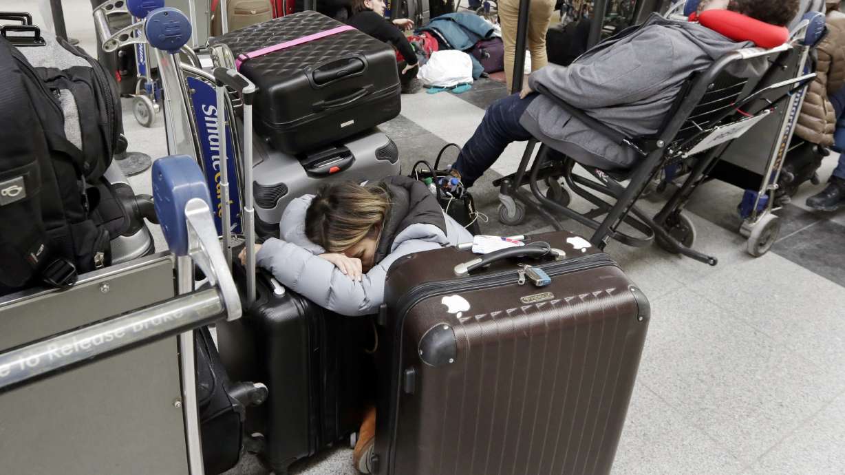The Latest: Airport agency head: JFK woes 'unacceptable'