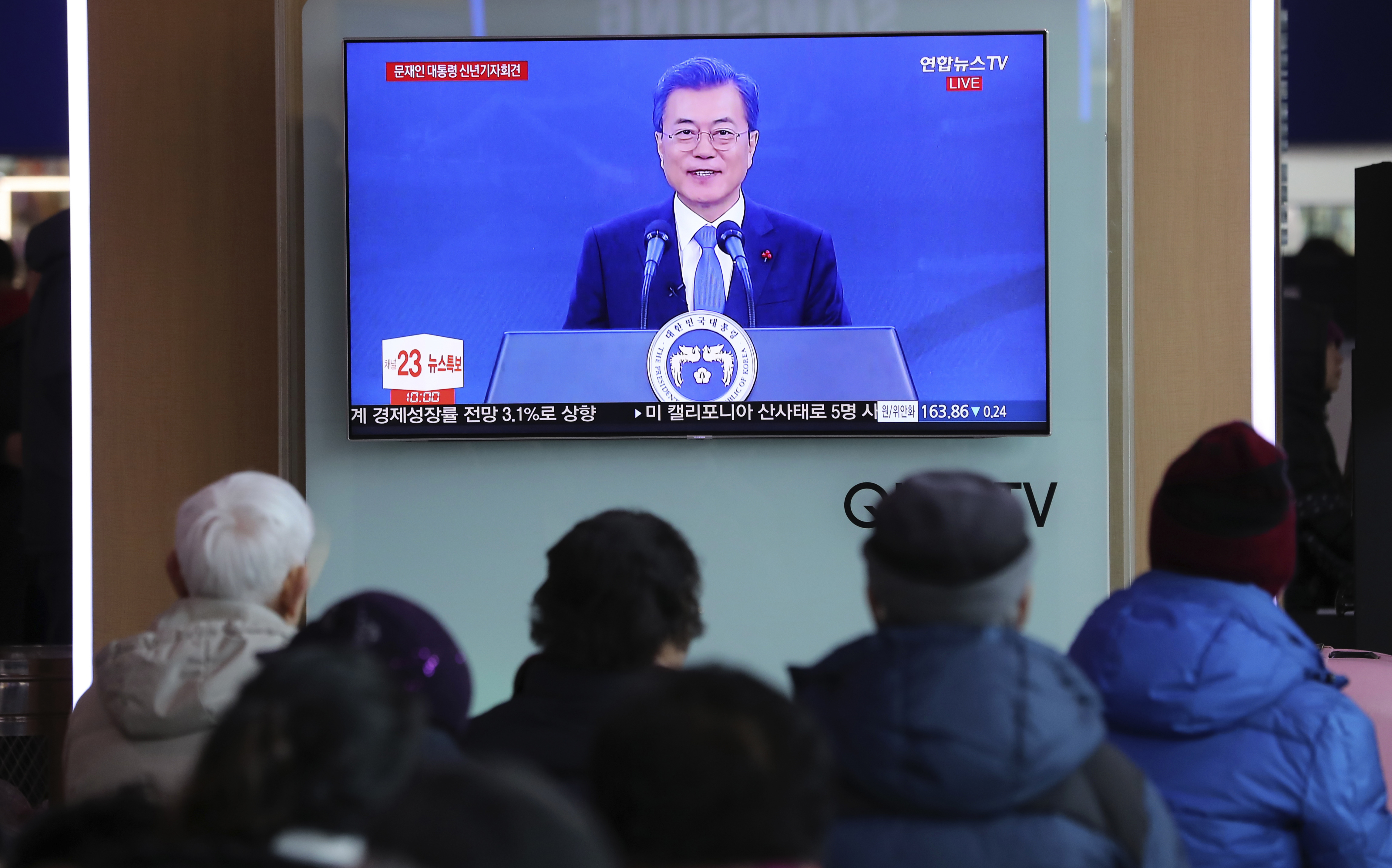 The Latest: South Korea's Moon willing to meet North's Kim