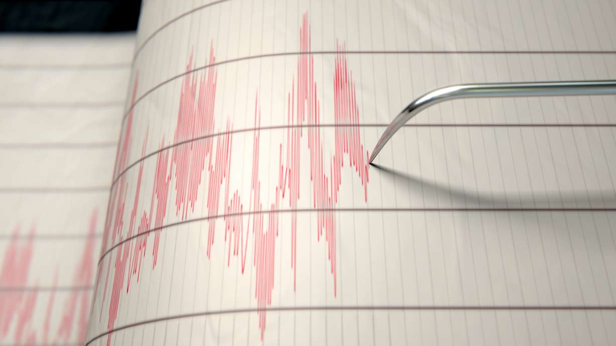 A closeup of a seismograph machine needle drawing a red line on graph paper depicting seismic and earthquake activity - 3D render