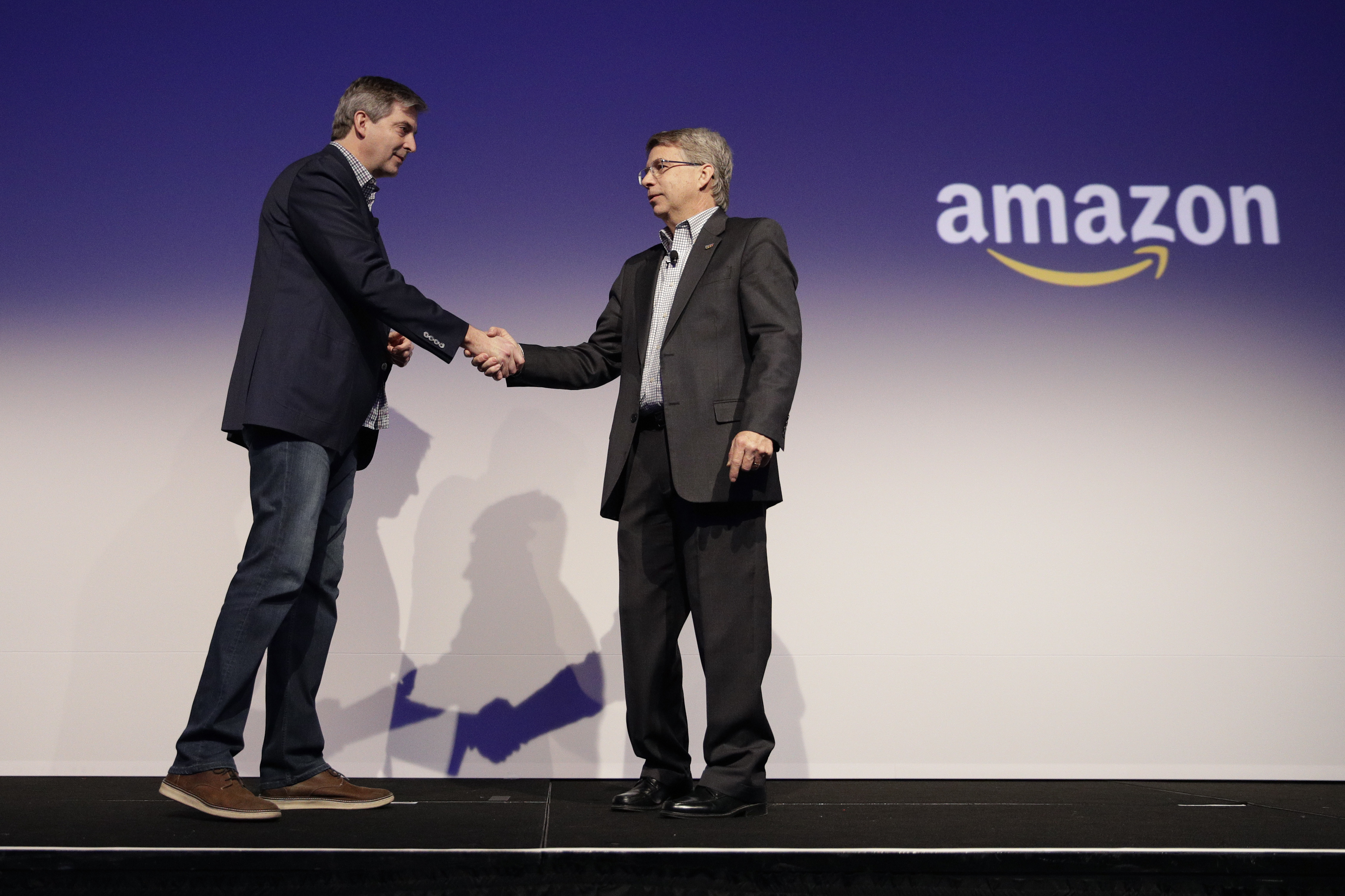 Behind the smart gadgets, Amazon and Google are waging war