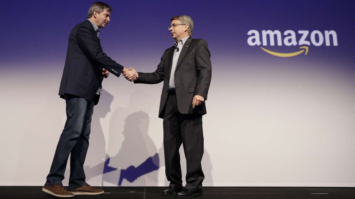 Behind the smart gadgets, Amazon and Google are waging war