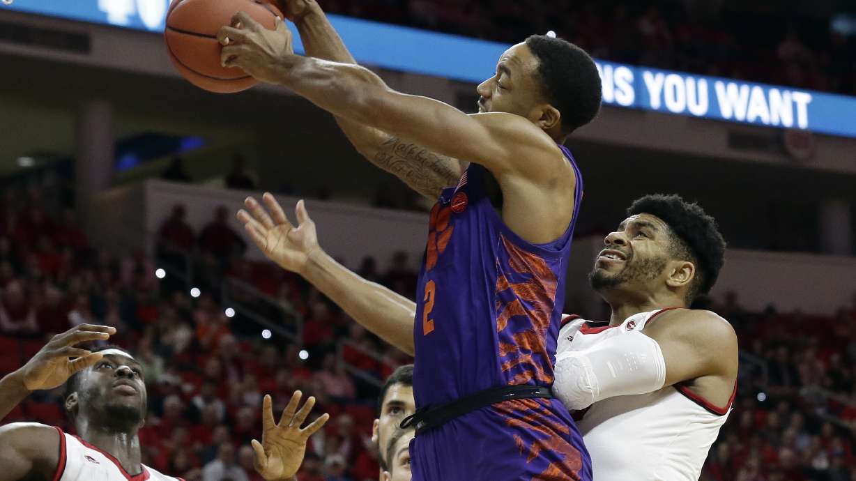 NC State upsets No. 19 Clemson 78-77 on DeVoe's missed FT