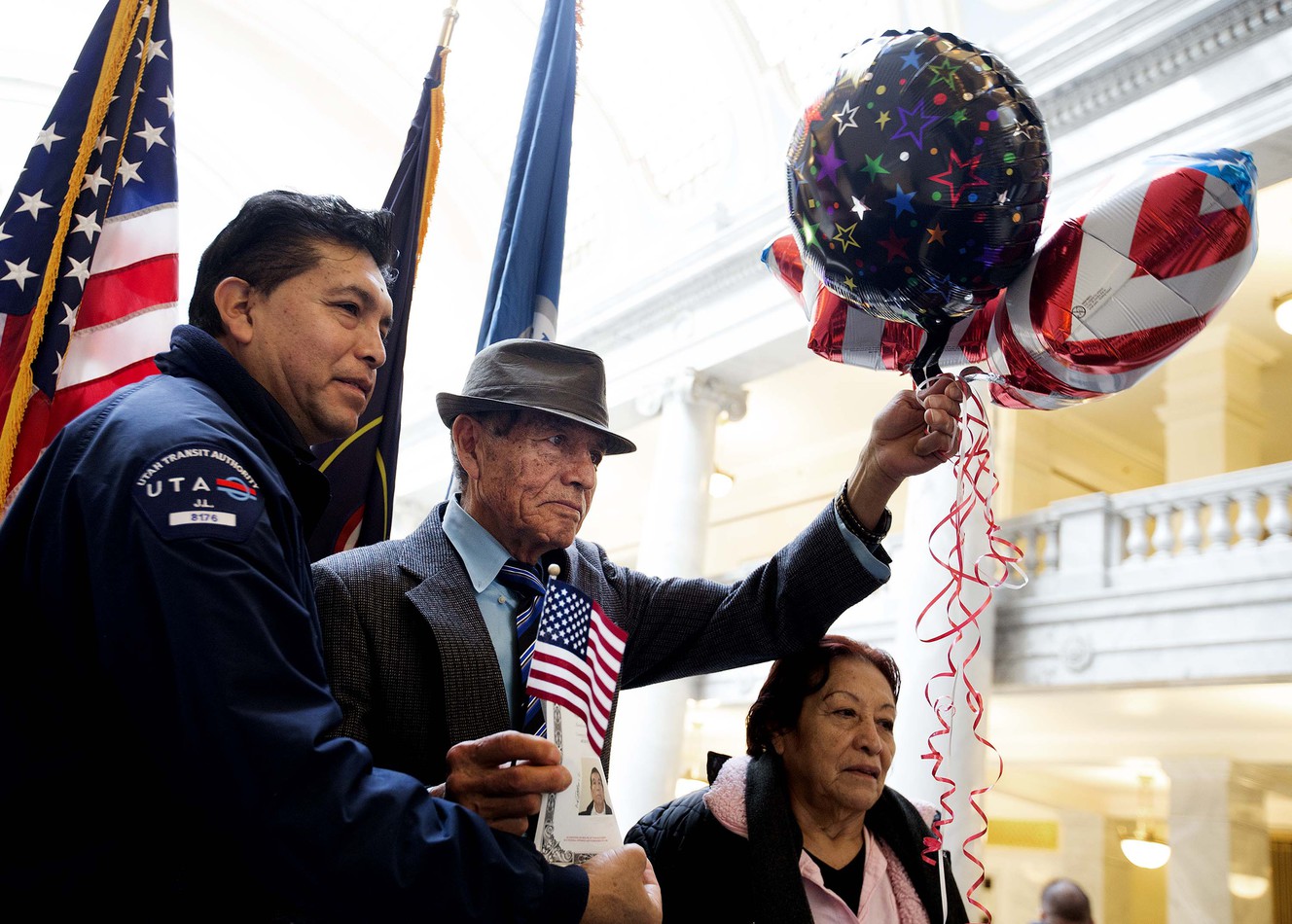 Angel Ledesma, 78, who is originally from Mexico, has his photograph taken with his son, Jose, and his wife, Lucia, after becoming an American citizen during a naturalization ceremony at the Capitol in Salt Lake City on Friday, Jan. 12, 2018. Ledesma has been living in America for 30 years. (Photo: Laura Seitz, KSL)