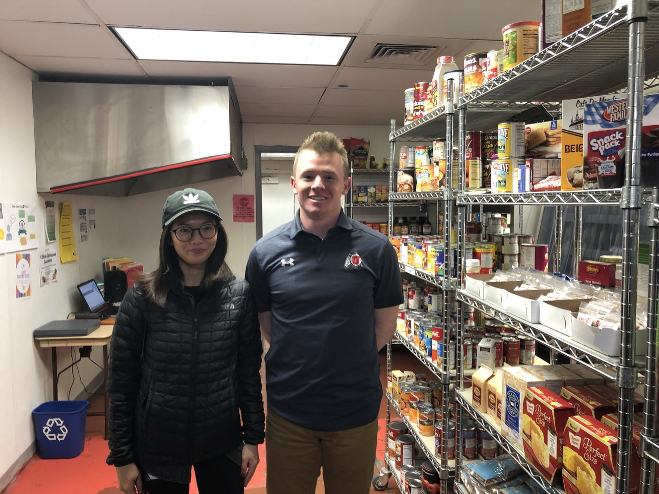 Chloe Lim, director of marketing, left, and Nick Knight, executive director, are pictured in the Feed U Pantry at the University of Utah on Thursday, Jan. 11, 2018. (Photo: Preston Cathcart, KSL)