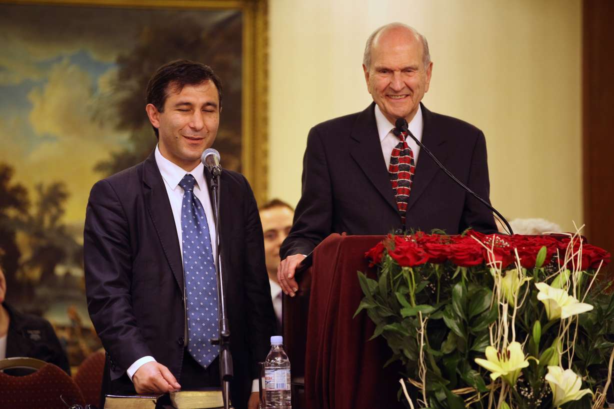 Varuzhan Poghosyan (left) translates for Elder Russell M. Nelson of the Quorum of the Twelve Apostles. The apostle created the first stake (similar to a diocese) of the Church in Yerevan, Armenia. (Photo: LDS Church)