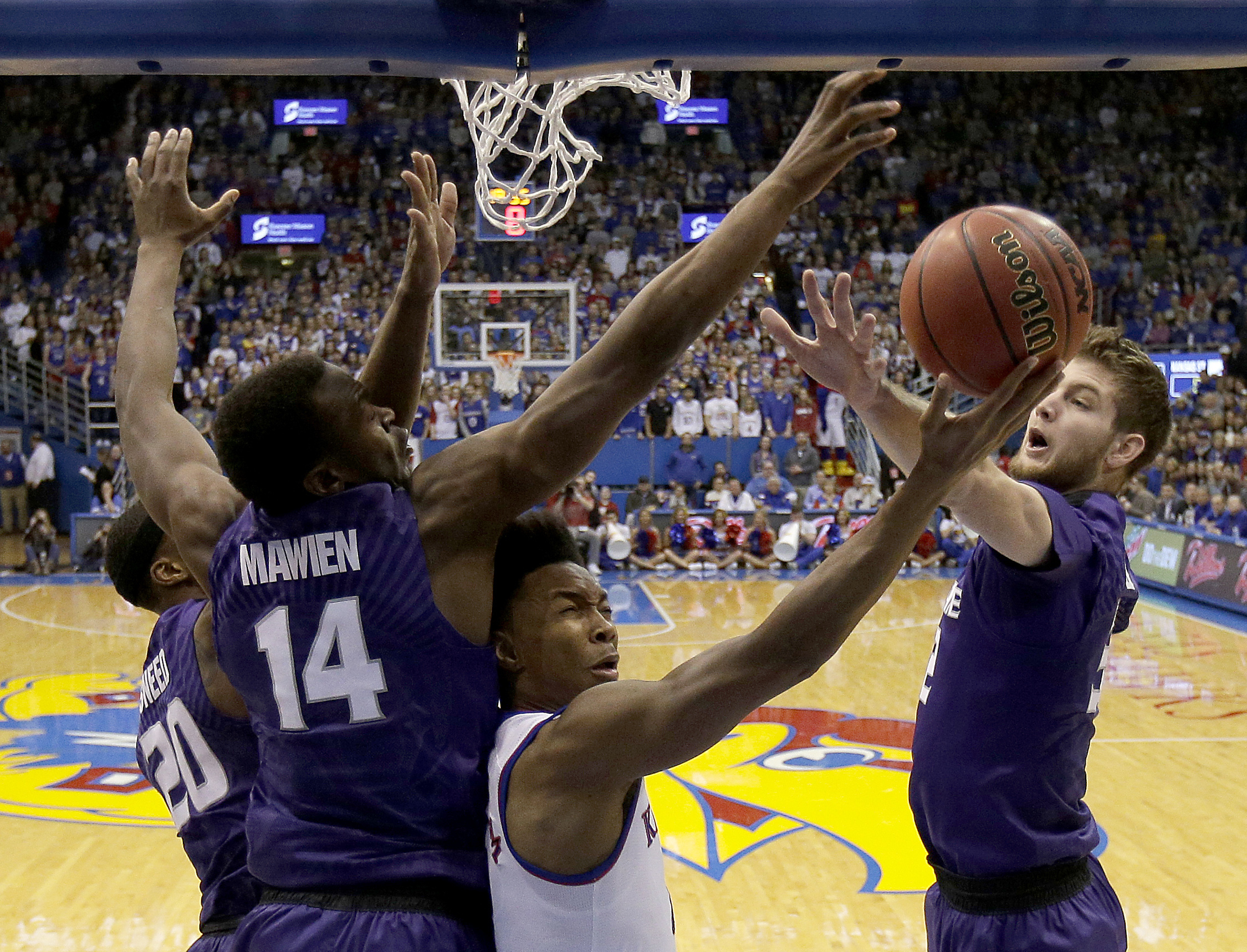 No. 12 Kansas holds on to beat Kansas State 73-72