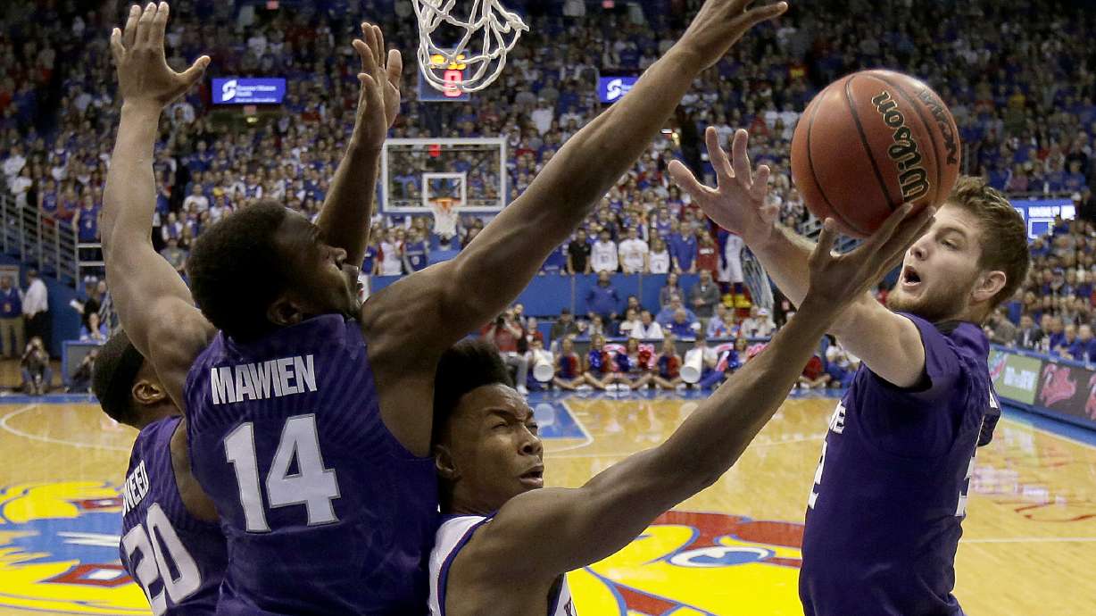 No. 12 Kansas holds on to beat Kansas State 73-72