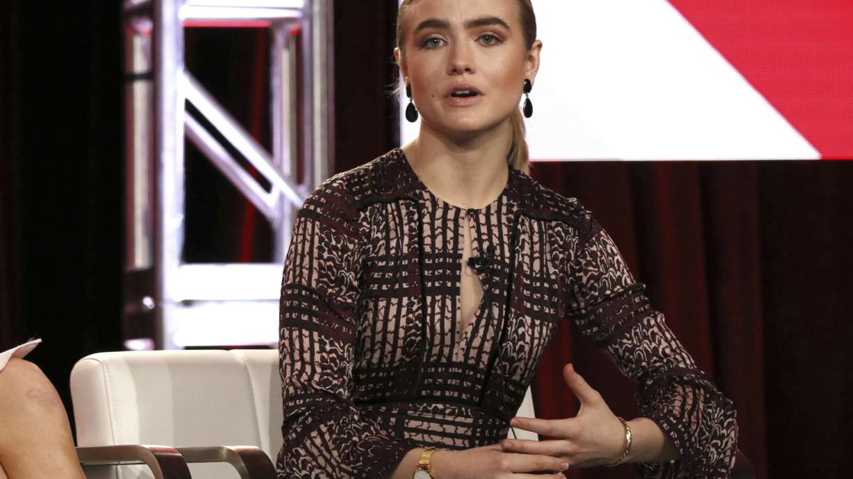 The Latest: Actor goes from playing clergyman to 'McMafia'