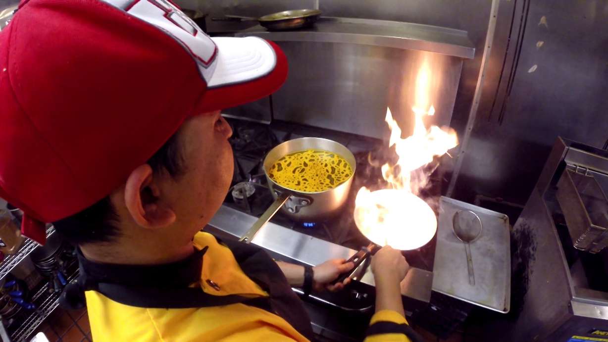 A chef cooks a dish at the Bhutan House Restaurant in Sandy on Tuesday, Jan. 9, 2018. (Photo: Ray Boone, KSL TV)