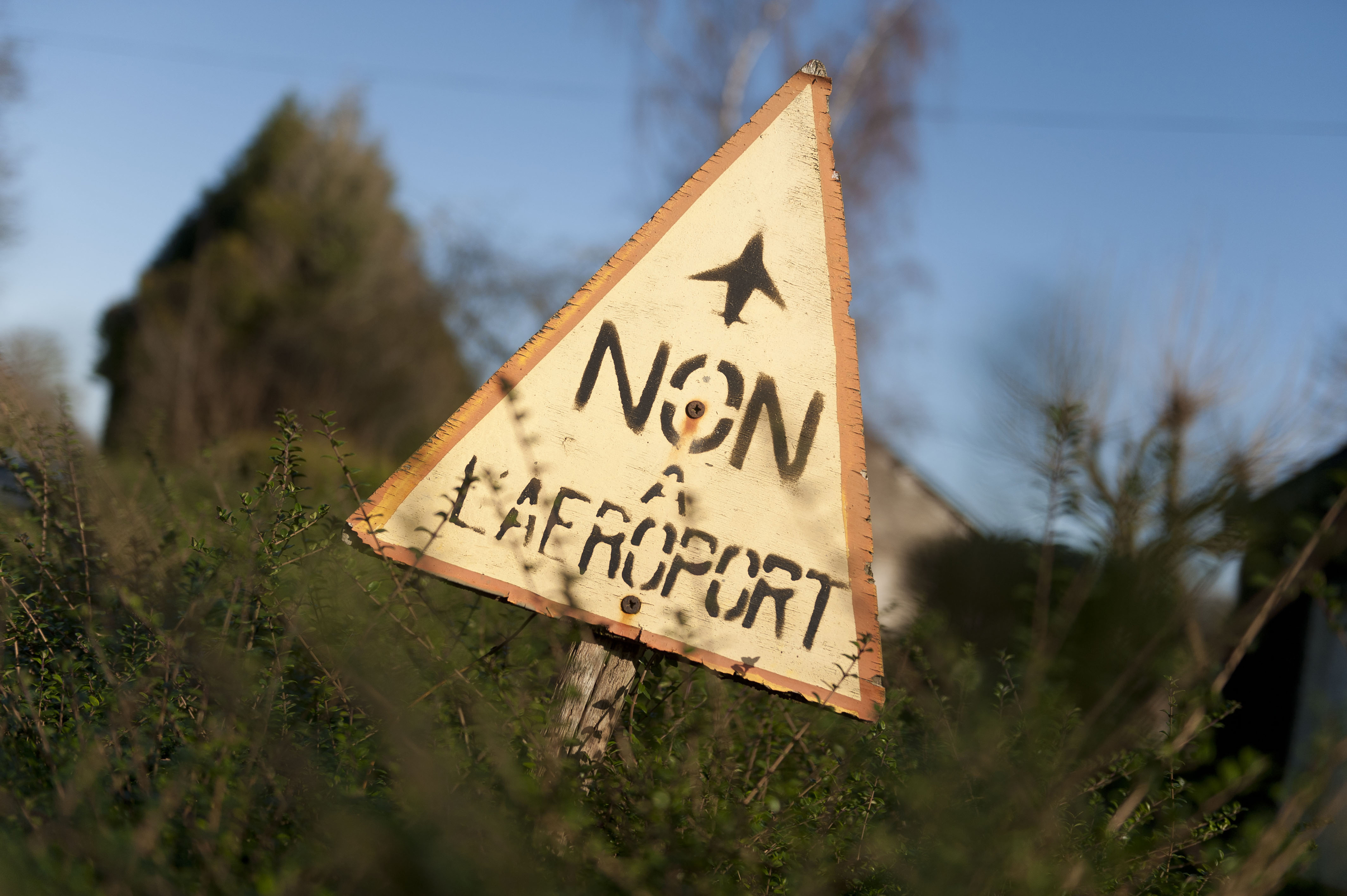 The Latest: French airport activists refuse order to leave